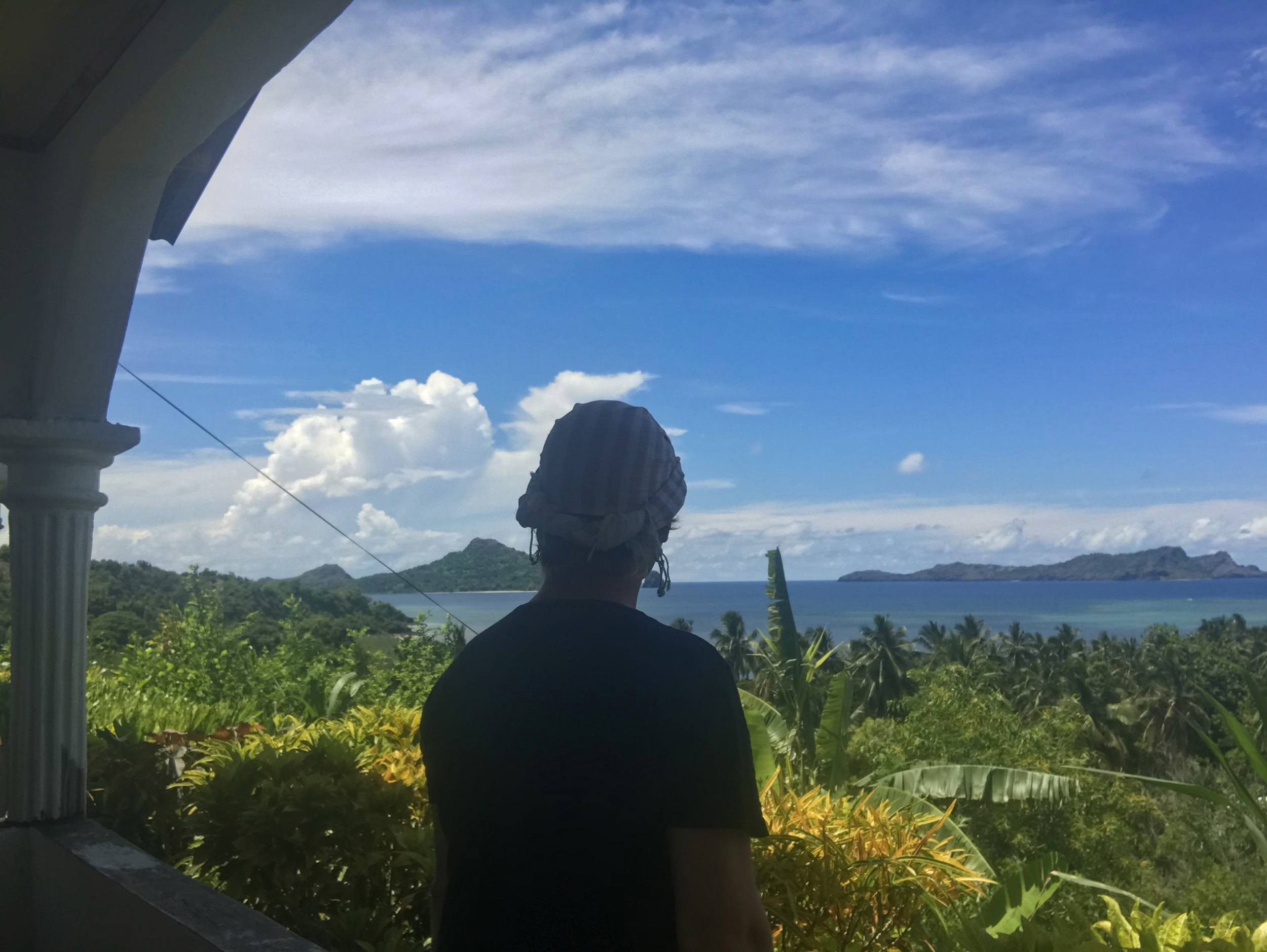 Ben facing Moheli Marine Park islands at Vanilla Lodge Moheli Comoros