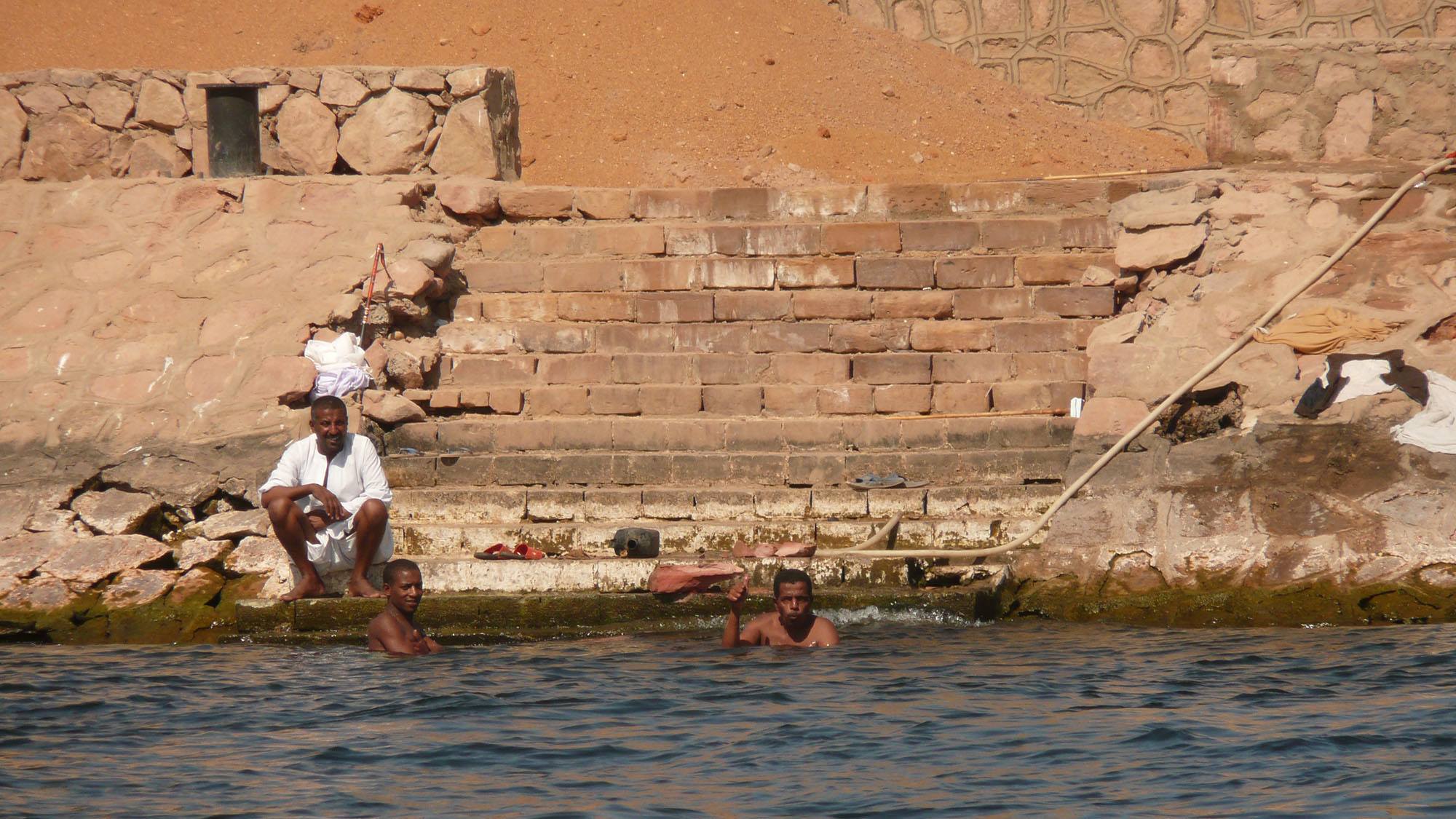 Egyptian men bathing in Nile Egypt