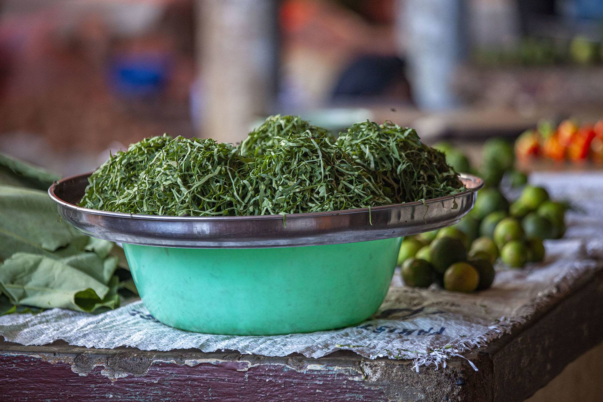 Greens and limes on display at municipal market in Mutsamudu Anjouan Comoros