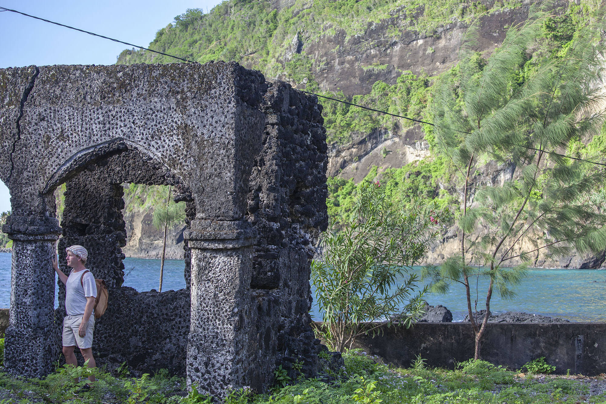 ben standing beside column of palace ruins in Iconi Comoros