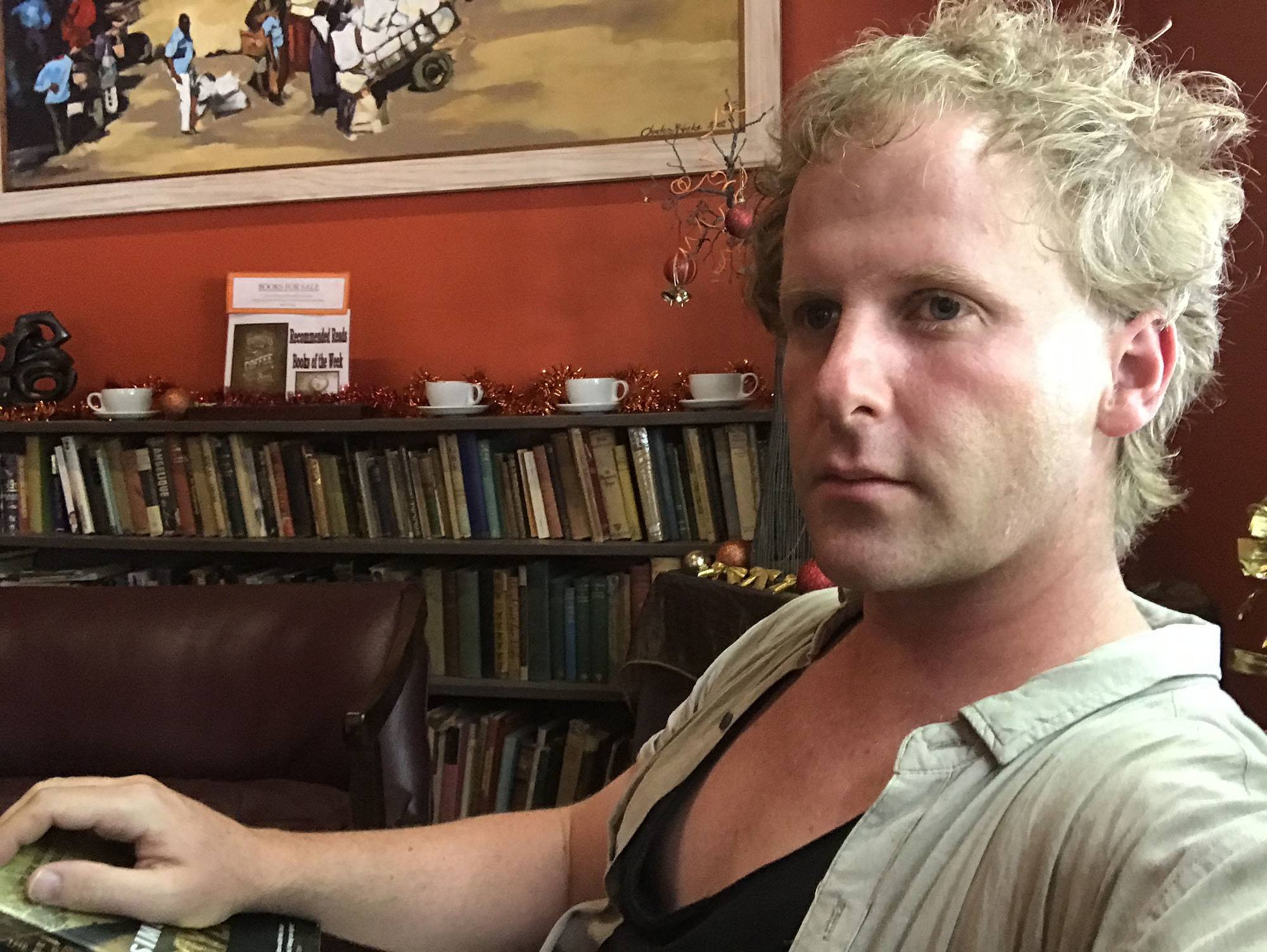 Ben sitting inside Indaba Book Cafe in Bulawayo Zimbabwe