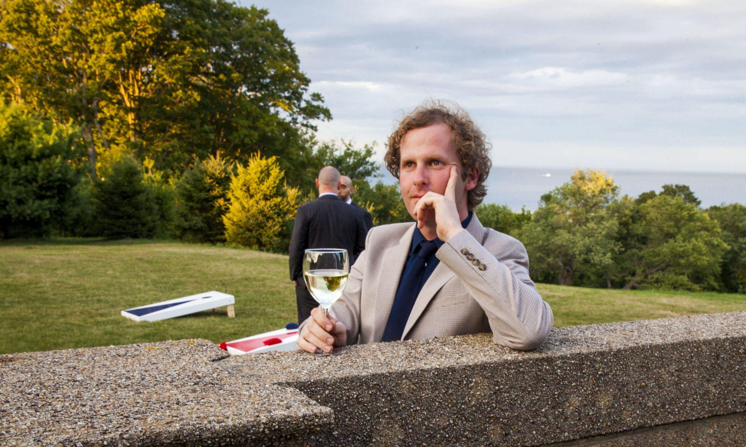 Ben with wine at Crane Estate reception New England USA