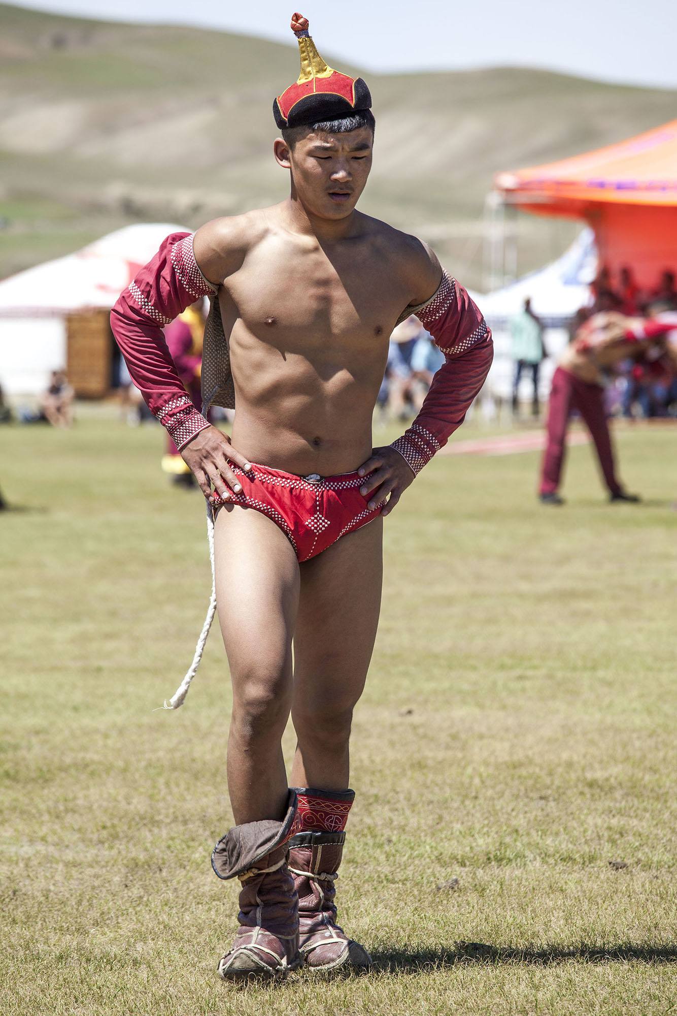 Mongolian wrestler at Naadam in Zodog and shuudag
