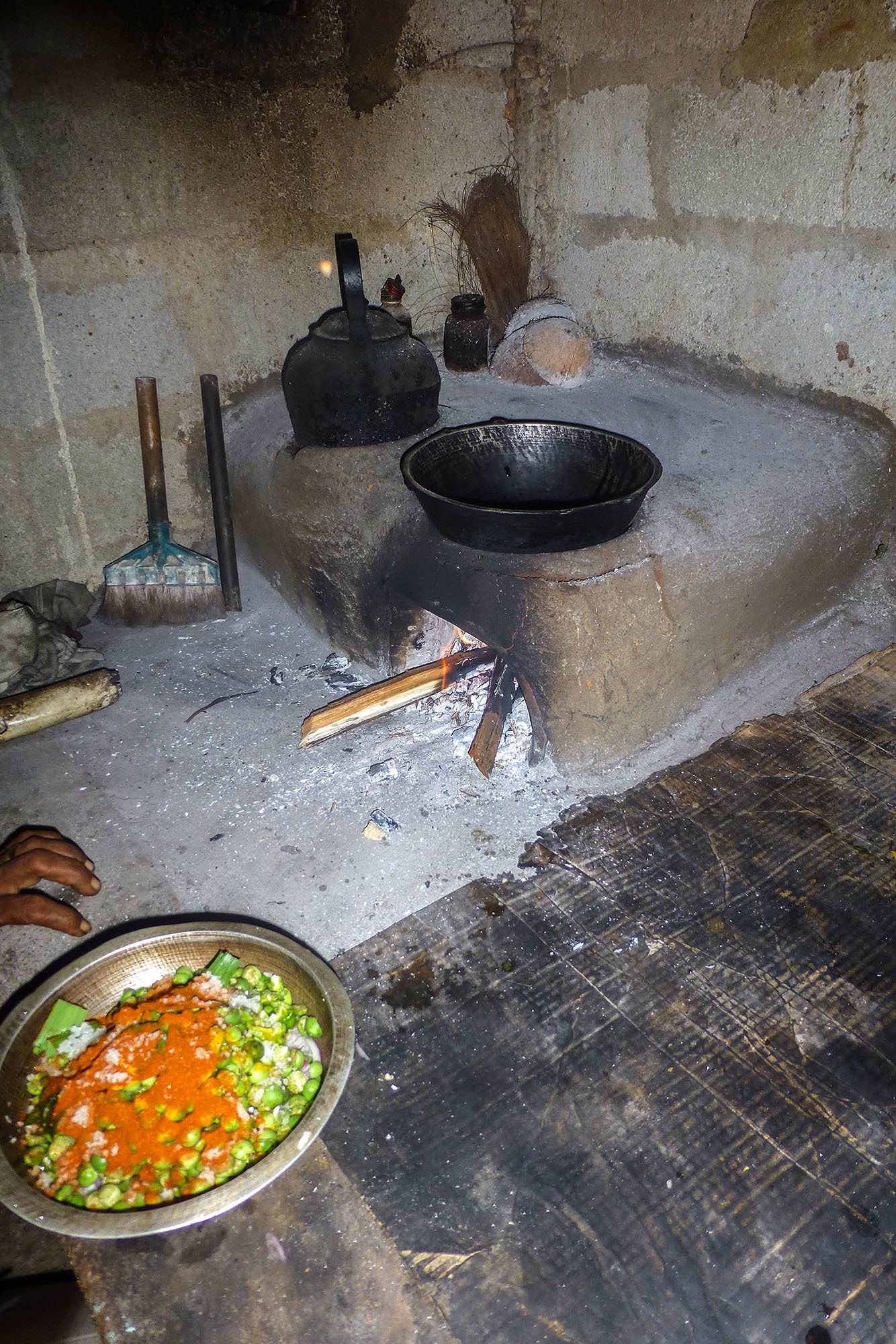 preparing dinner on floor of Sri Lankan home Sigiriya