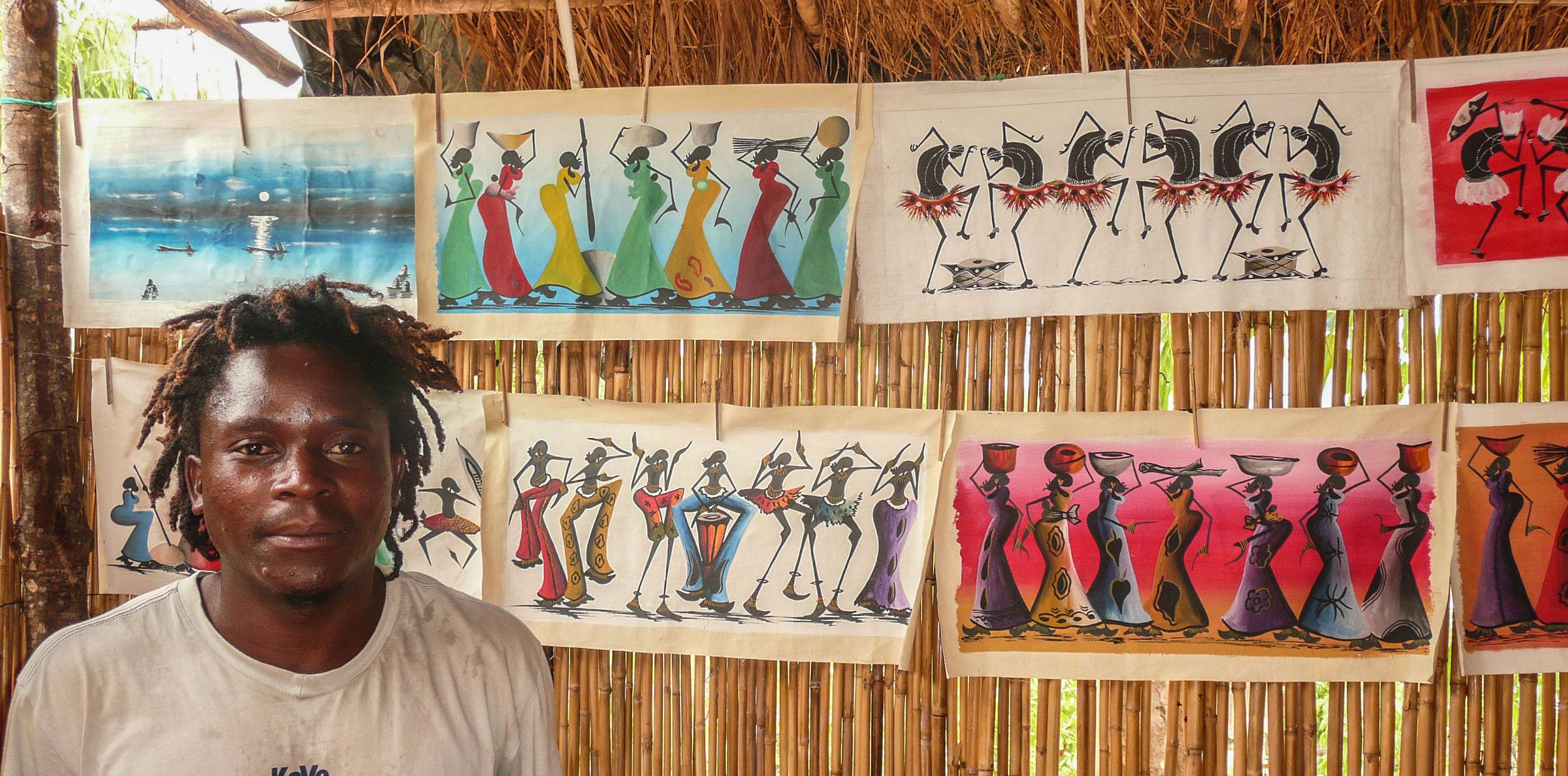 Artist selling paintings near Nkhata Bay Malawi