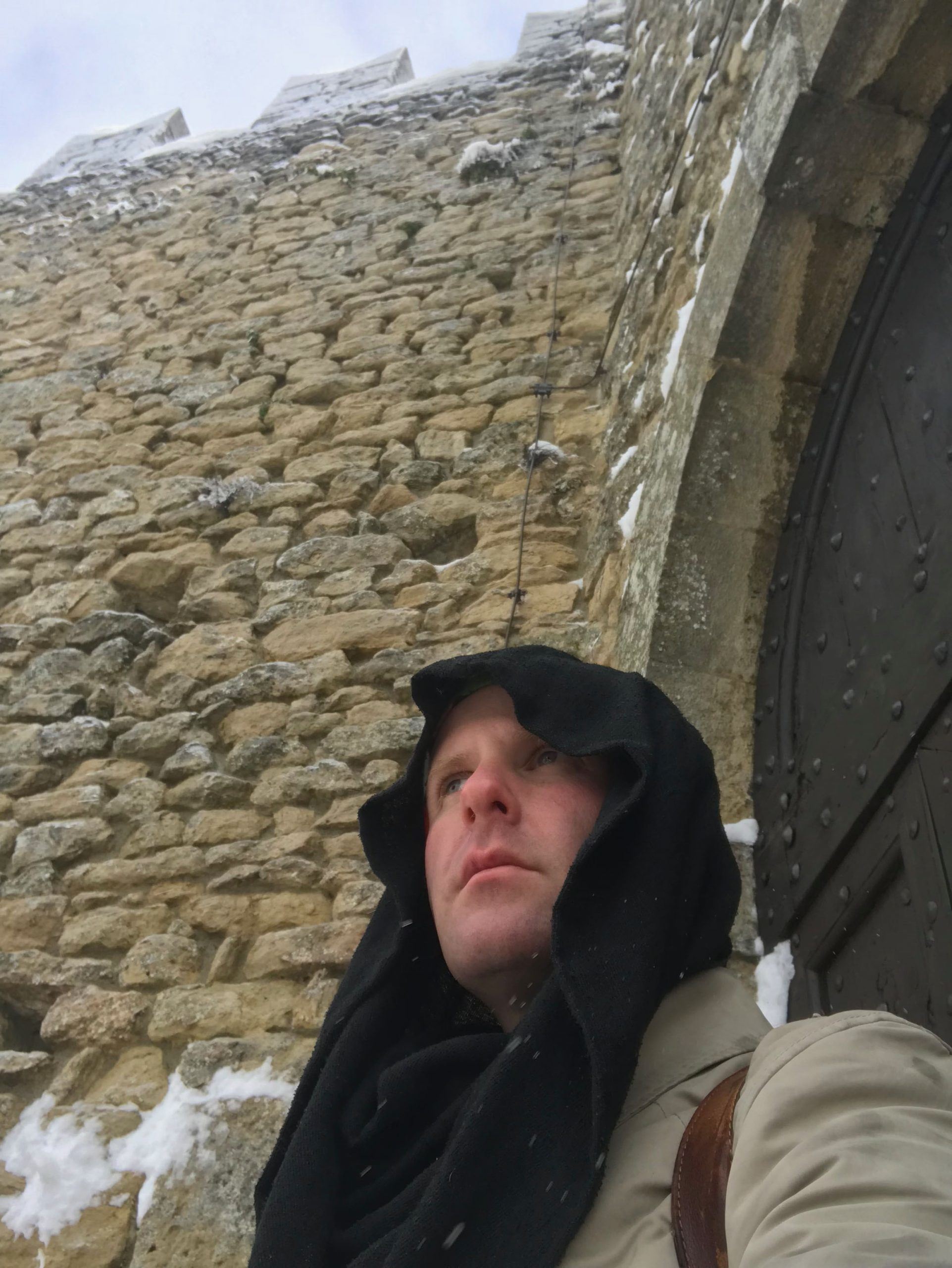 Ben near Guaita Tower in City of San Marino in winter