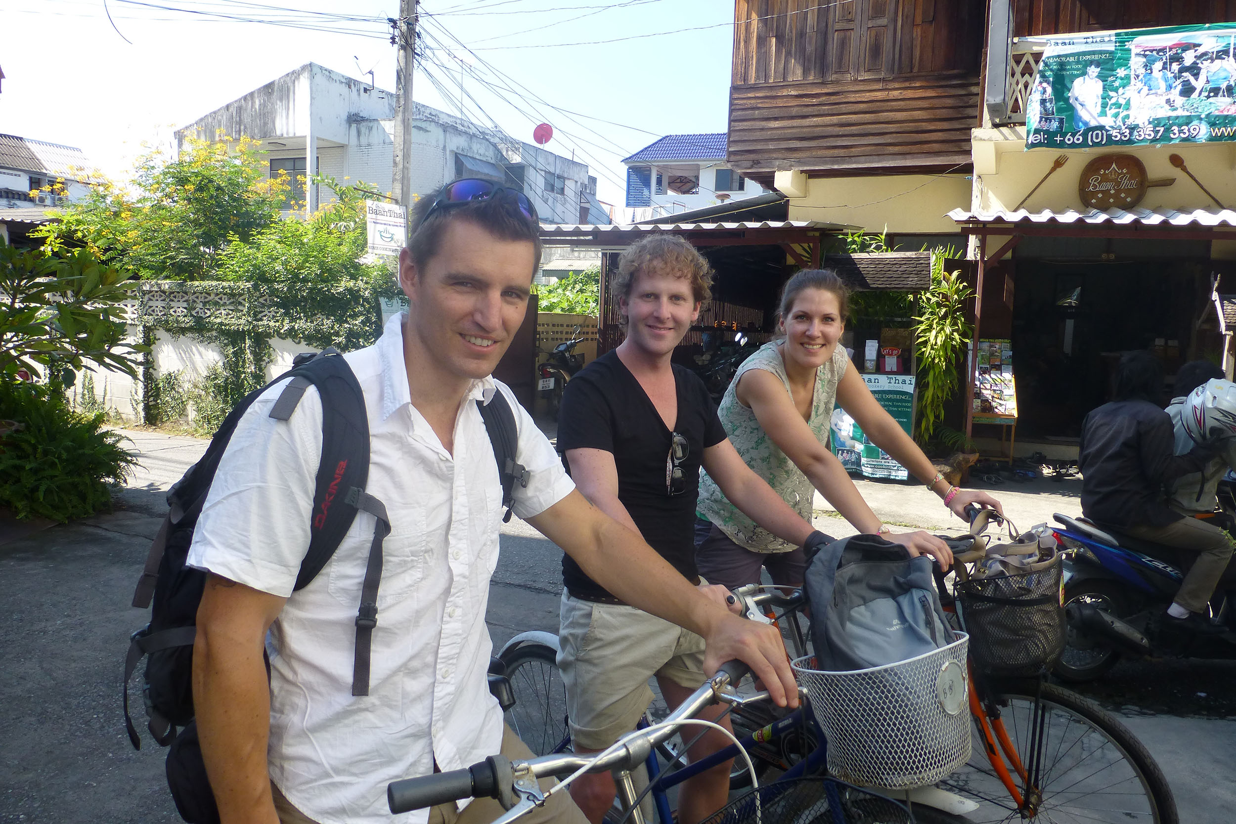Ben riding a bicycle with new friends in Chiang Mai Thailand