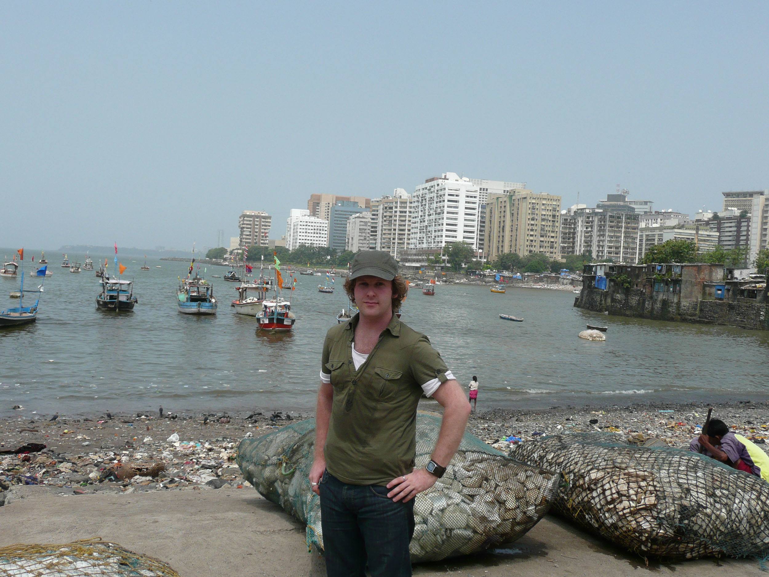 Ben standing on beach near Marine Drive Mumbai India