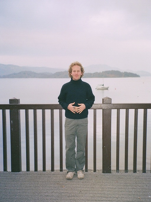 Ben standing on deck over Loch Lomond Scotland