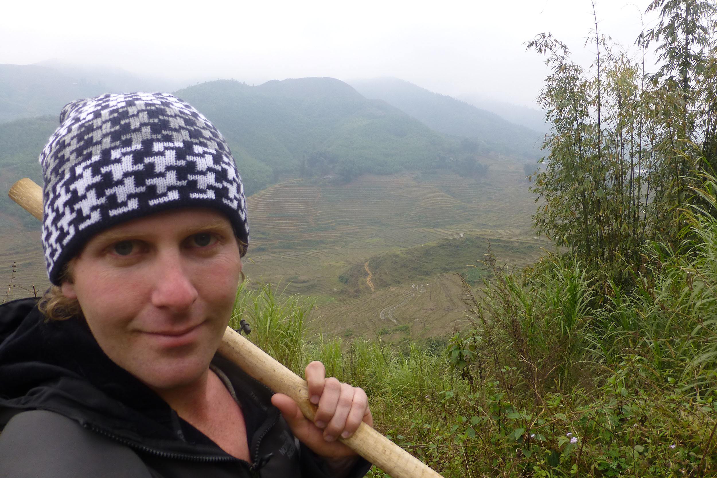 Ben trekking through terraced rice fields in Sa Pa Vietnam