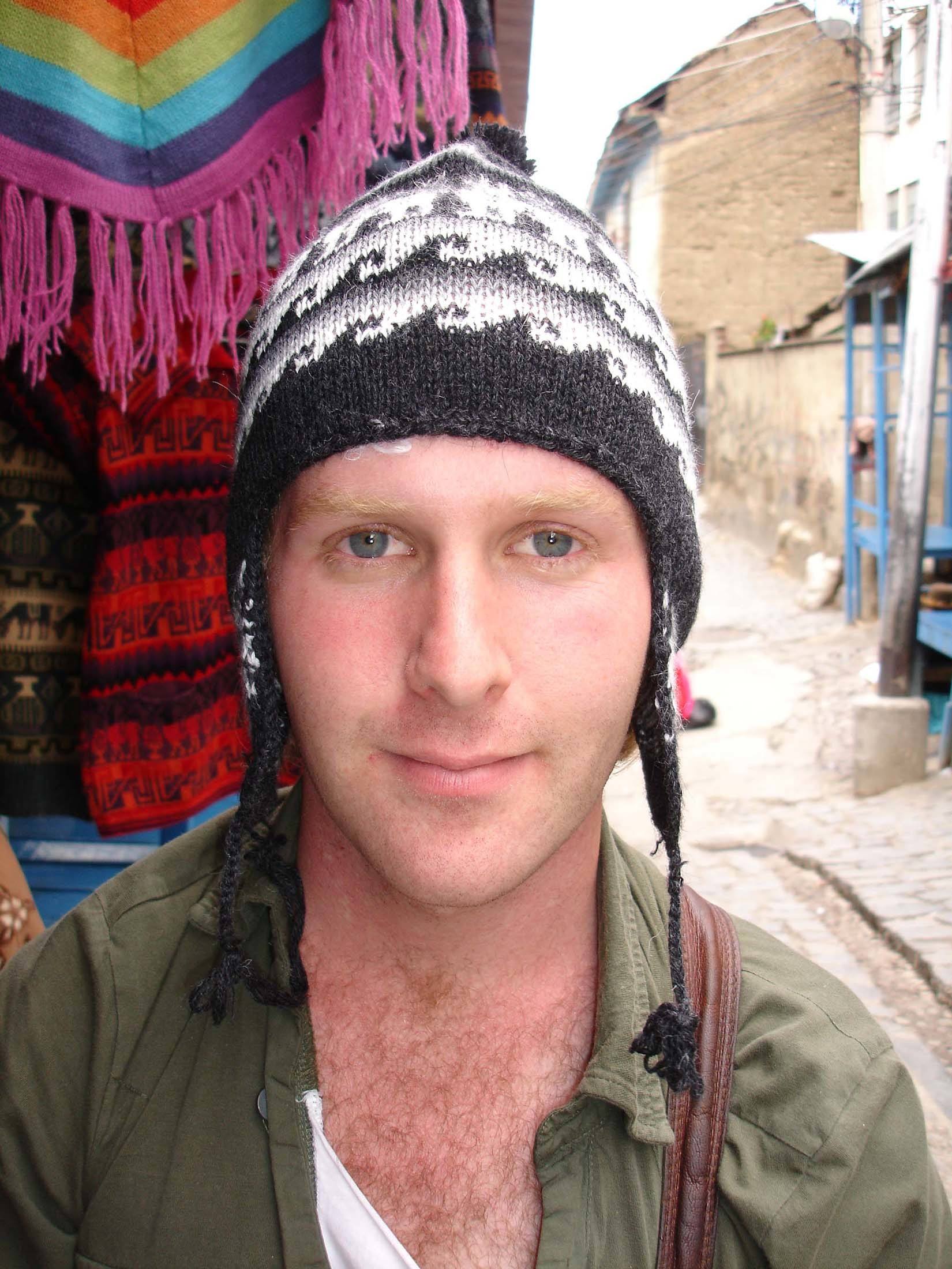 Ben wearing beanie in the streets of La Paz Bolivia