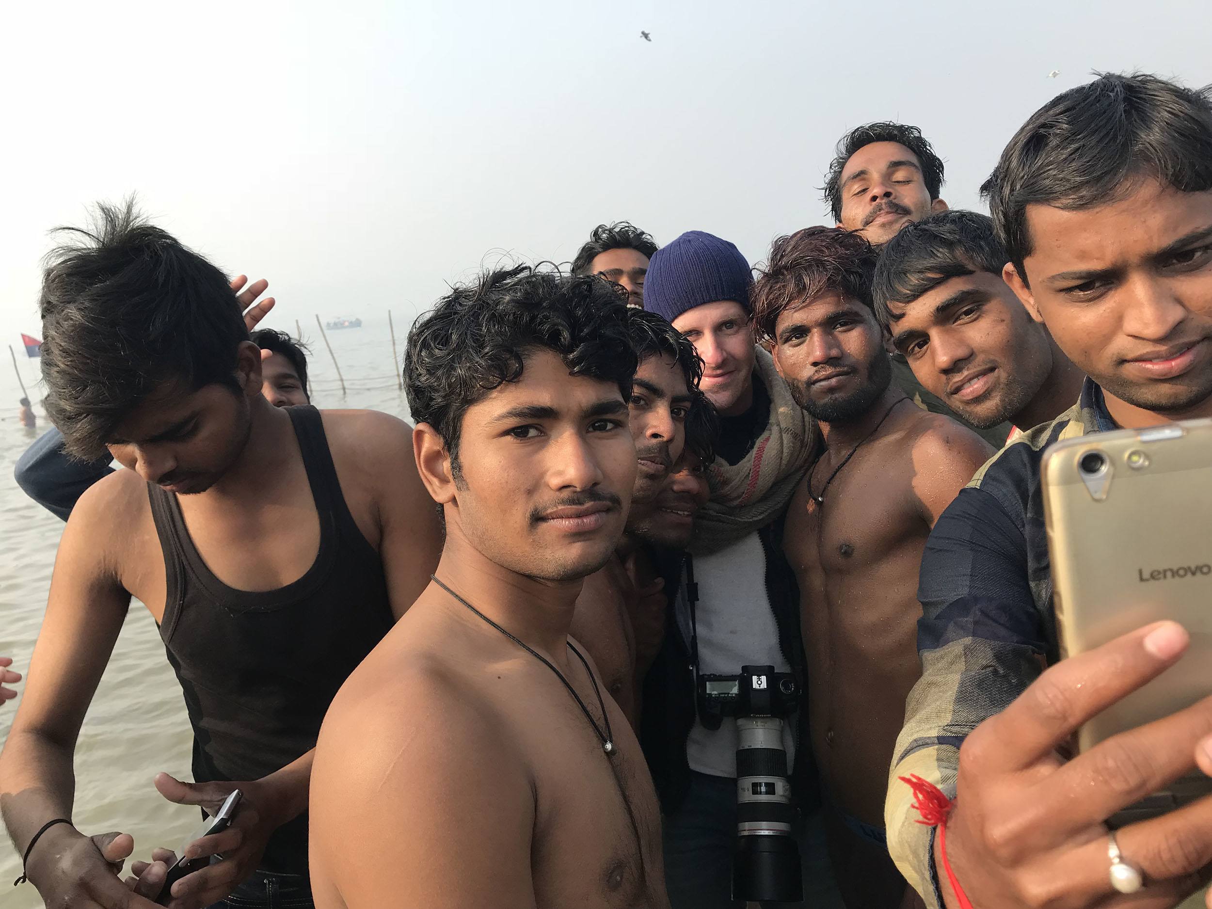 Ben with Indian men at Magh Mela in Allahabad India