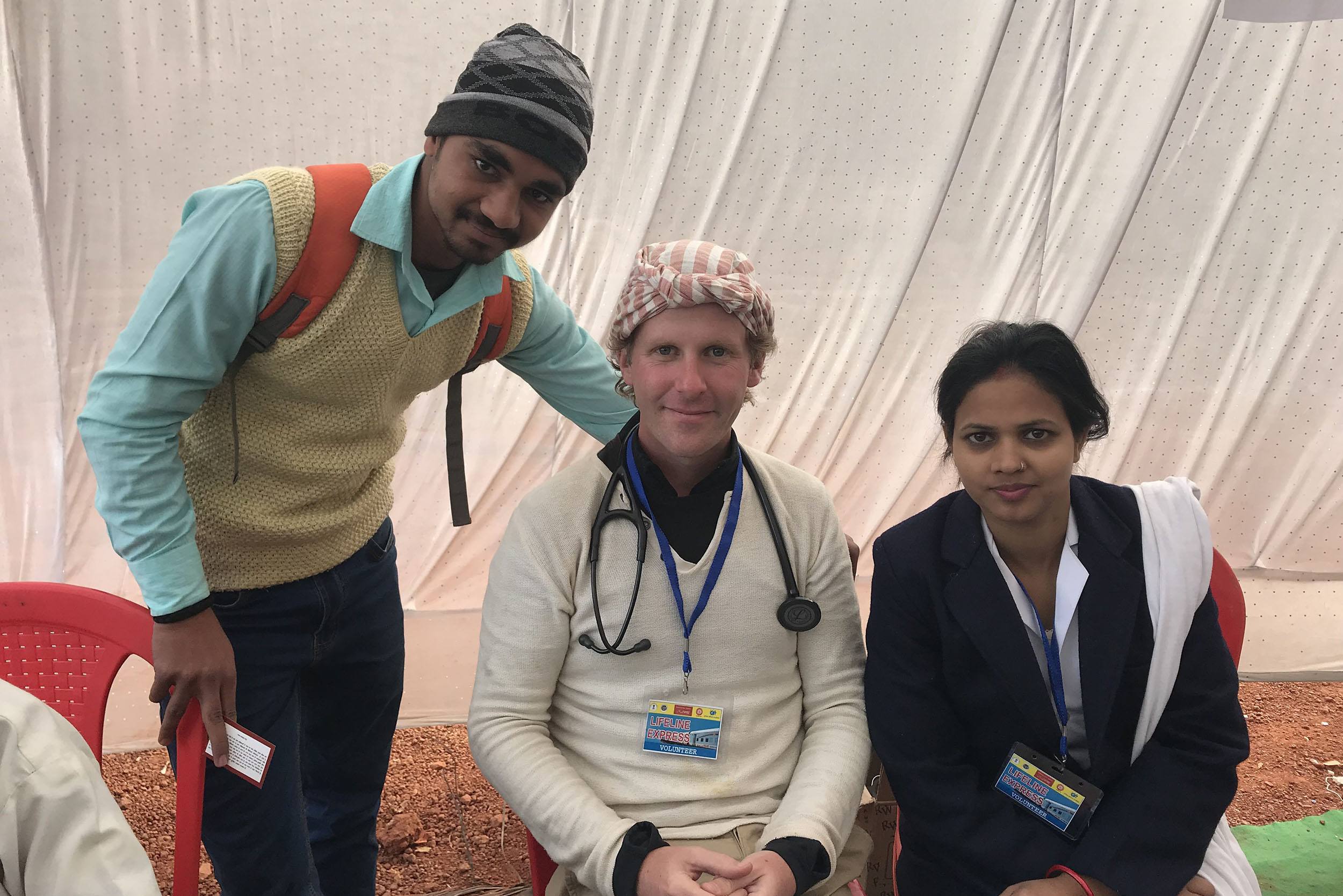 Ben with an Indian nurse and a local outside the Lifeline Express in Ghazipur India