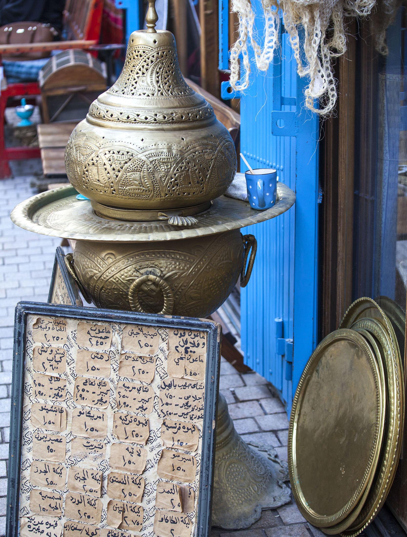 Brass pot outside Beit Ahmed inside Souq Al-Mubarakiya in Kuwait