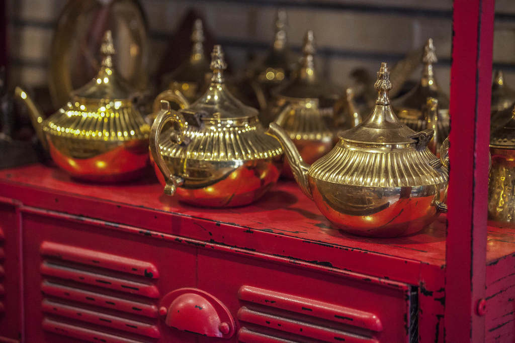 Brass tea pots for sale in Beit Ahmed inside Souq Al-Mubarakiya in Kuwait