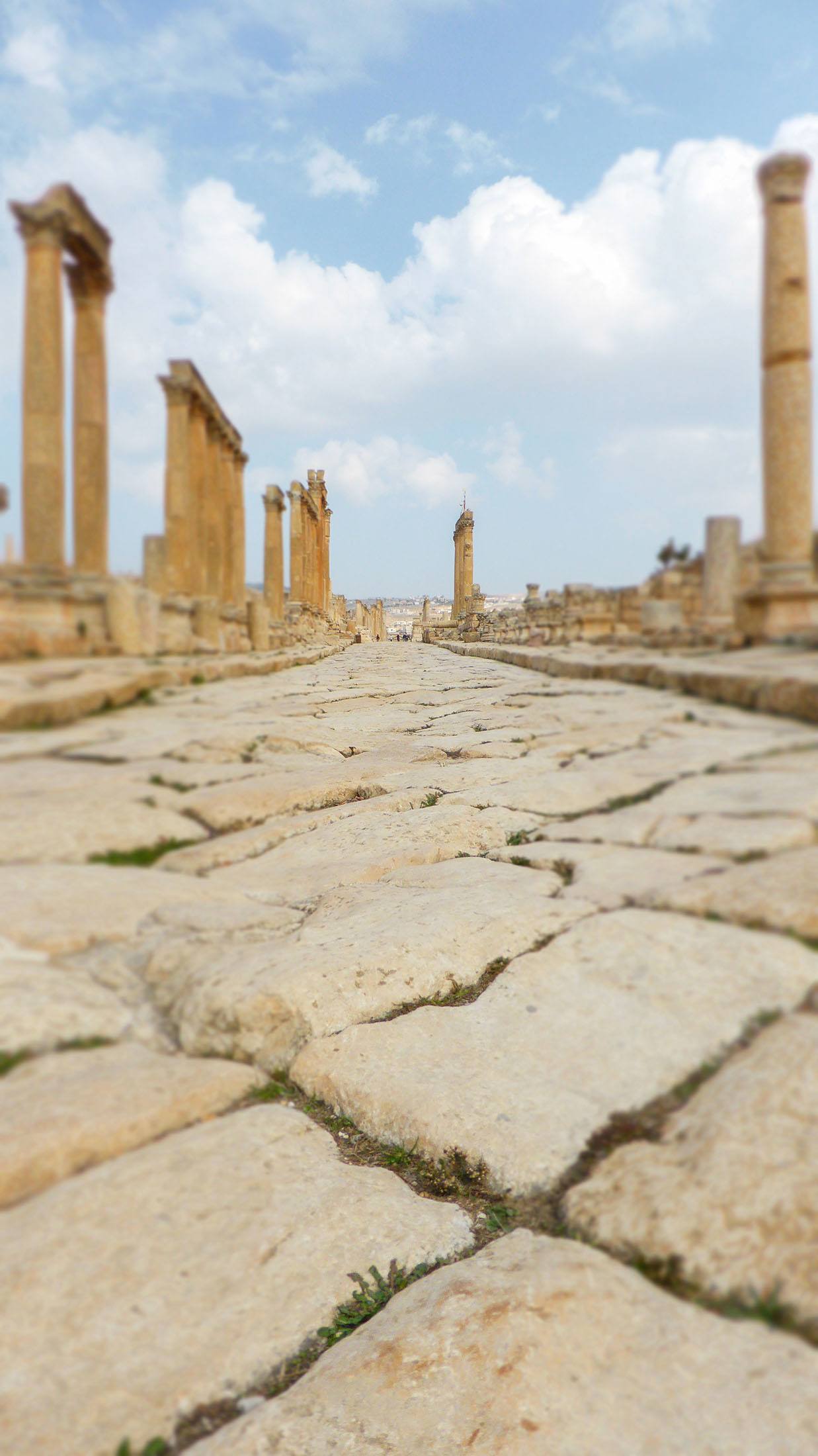 Closeup of stones comprising Cardo Maximus (Colonnaded Street) in Jerash Jordan