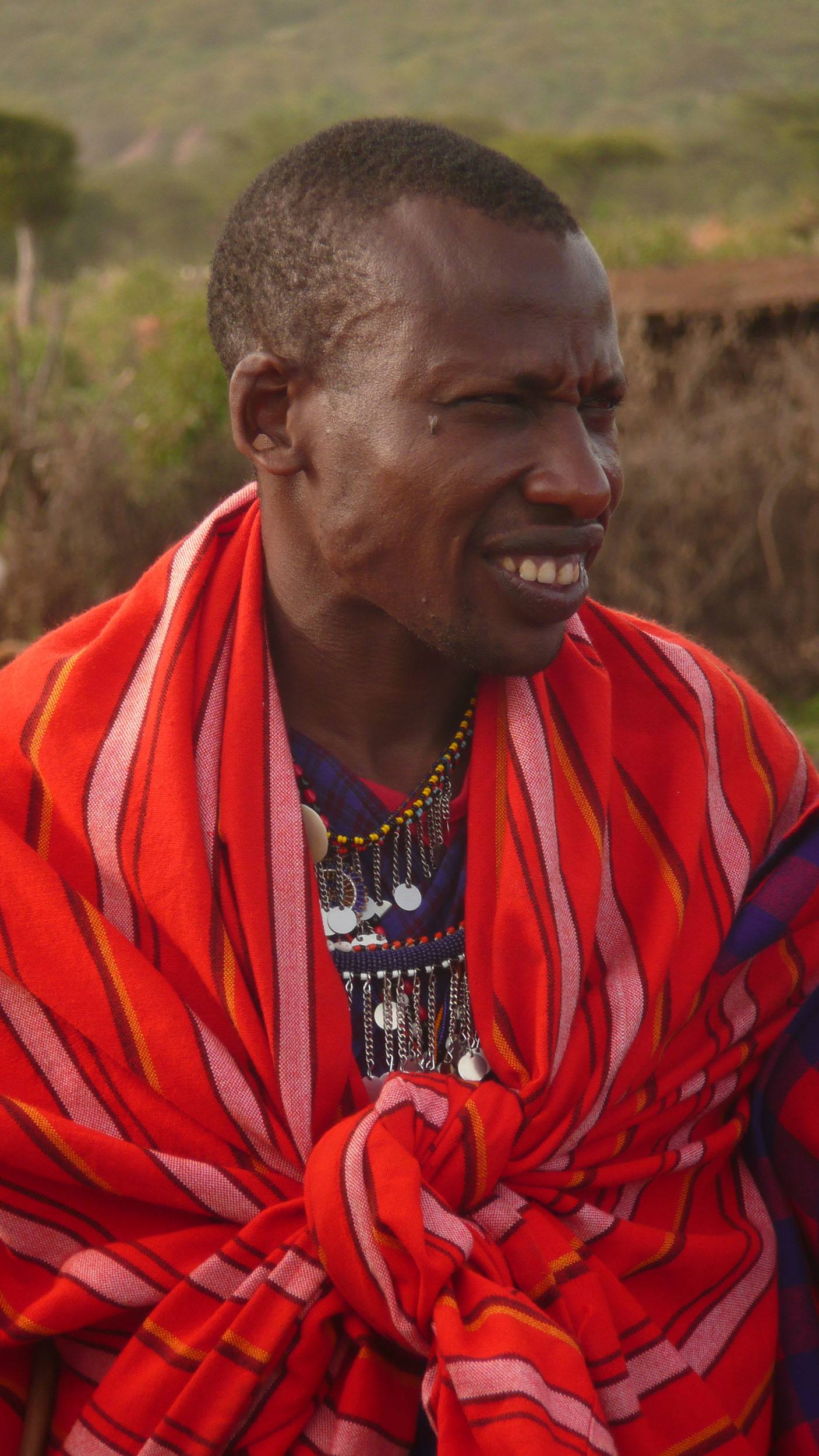 Colourfully adorned Maasai Man in the Masai Mara Kenya