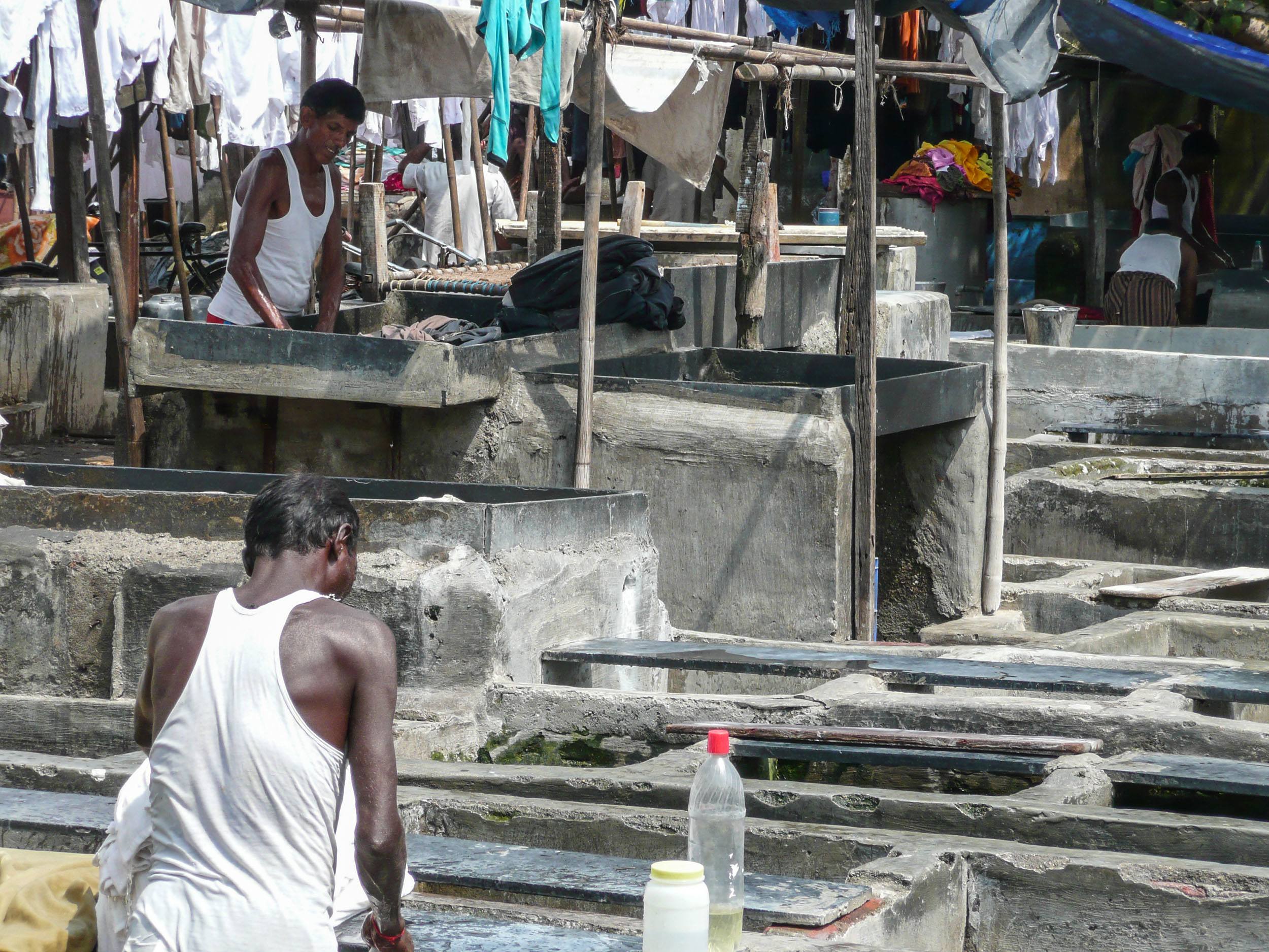 Dhobis cleaning clothes in Dhobi Ghat Mumbai India