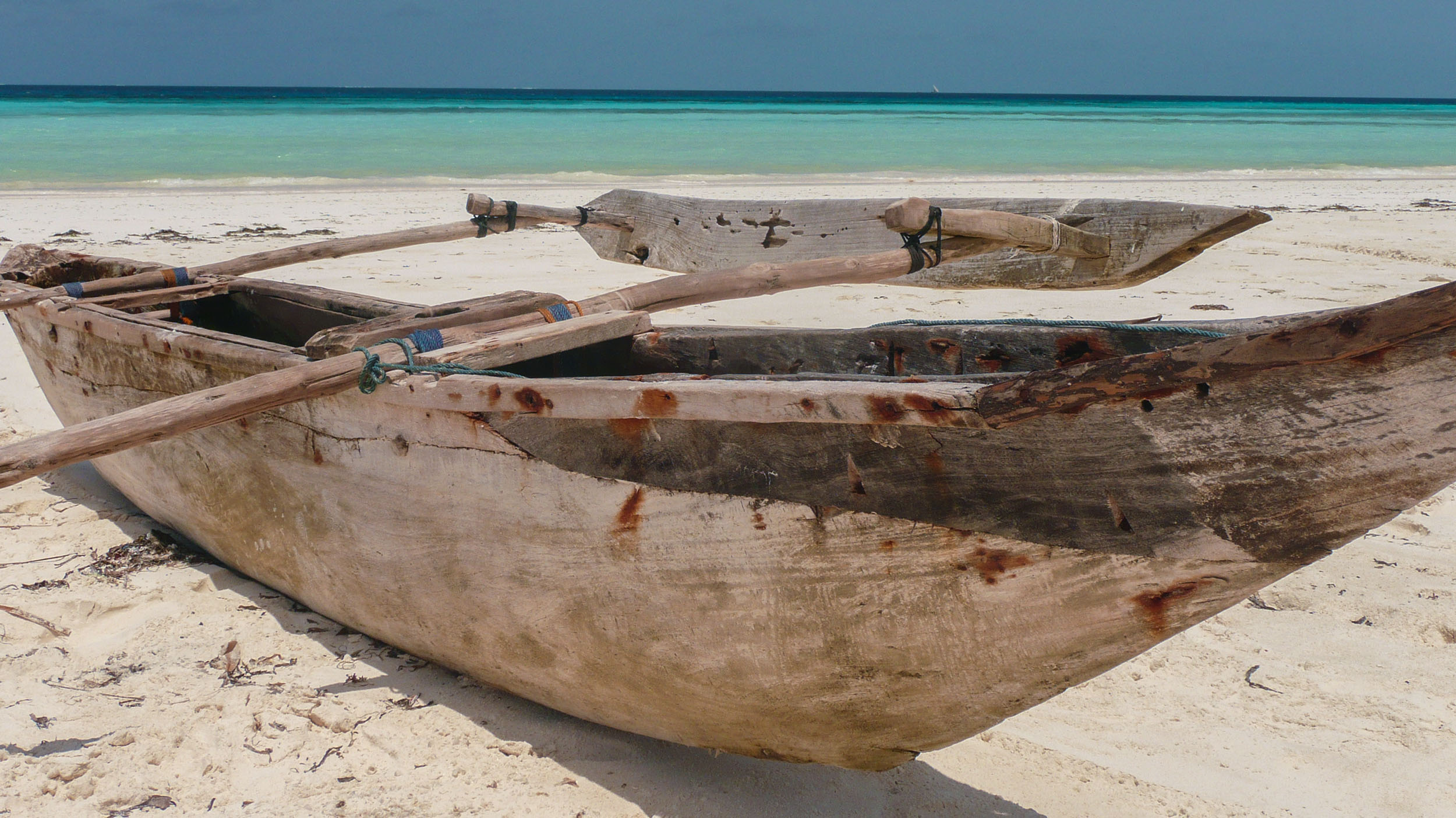 Dugout canoe on beach of Zanzibar Tanzania