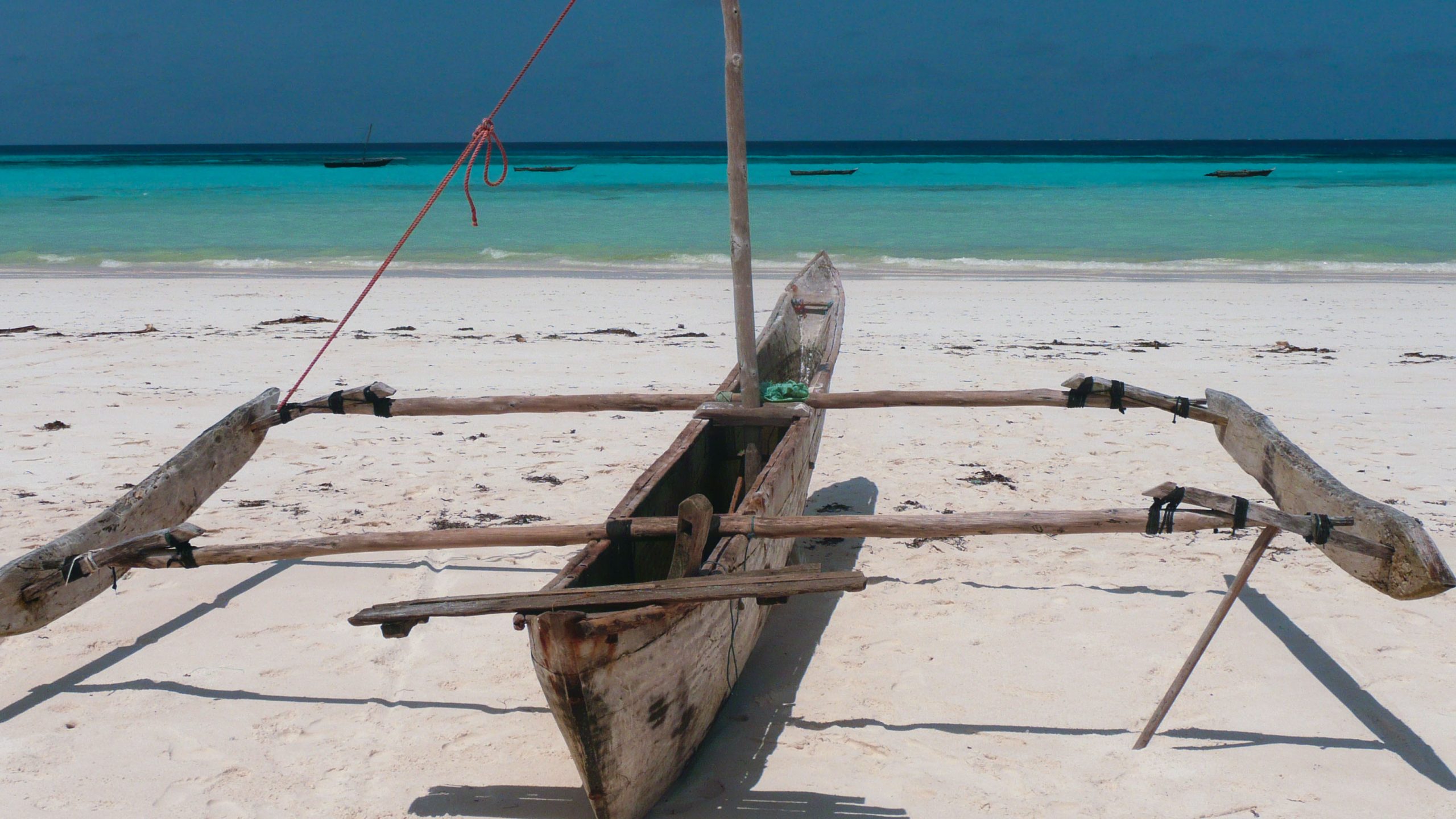 Dugout canoe on beach of island in archipelago of Zanzibar Tanzania