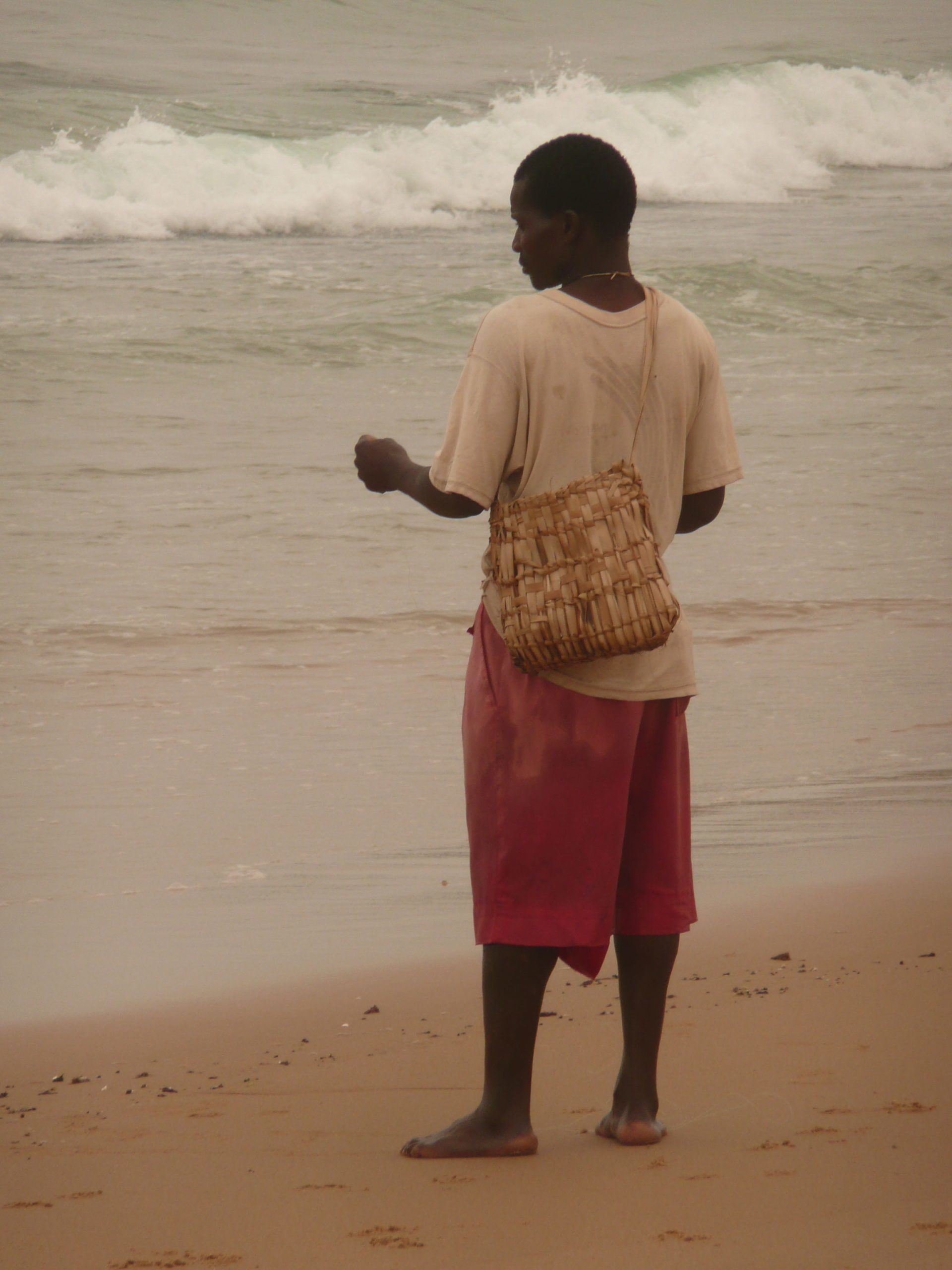 Man fishing on Tofo Beach Mozambique