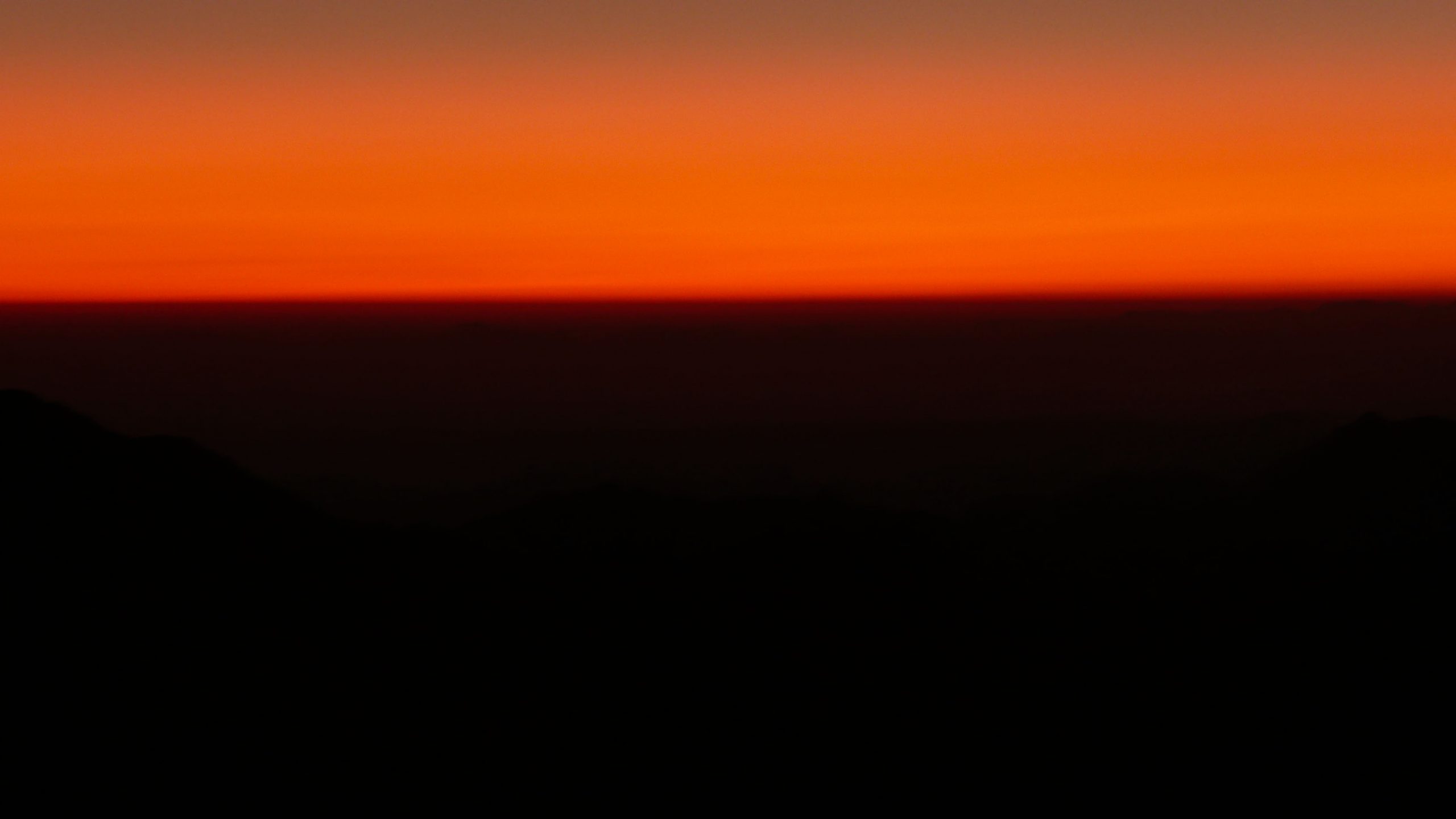 Orange to red sky at sunrise from Mt Sinai Egypt