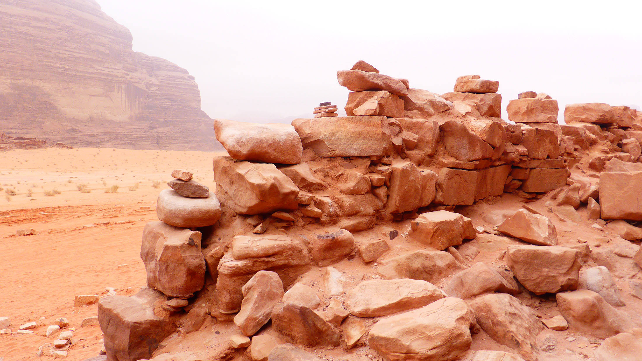 Piles of stones near Lawrence House Wadi Rum Jordan