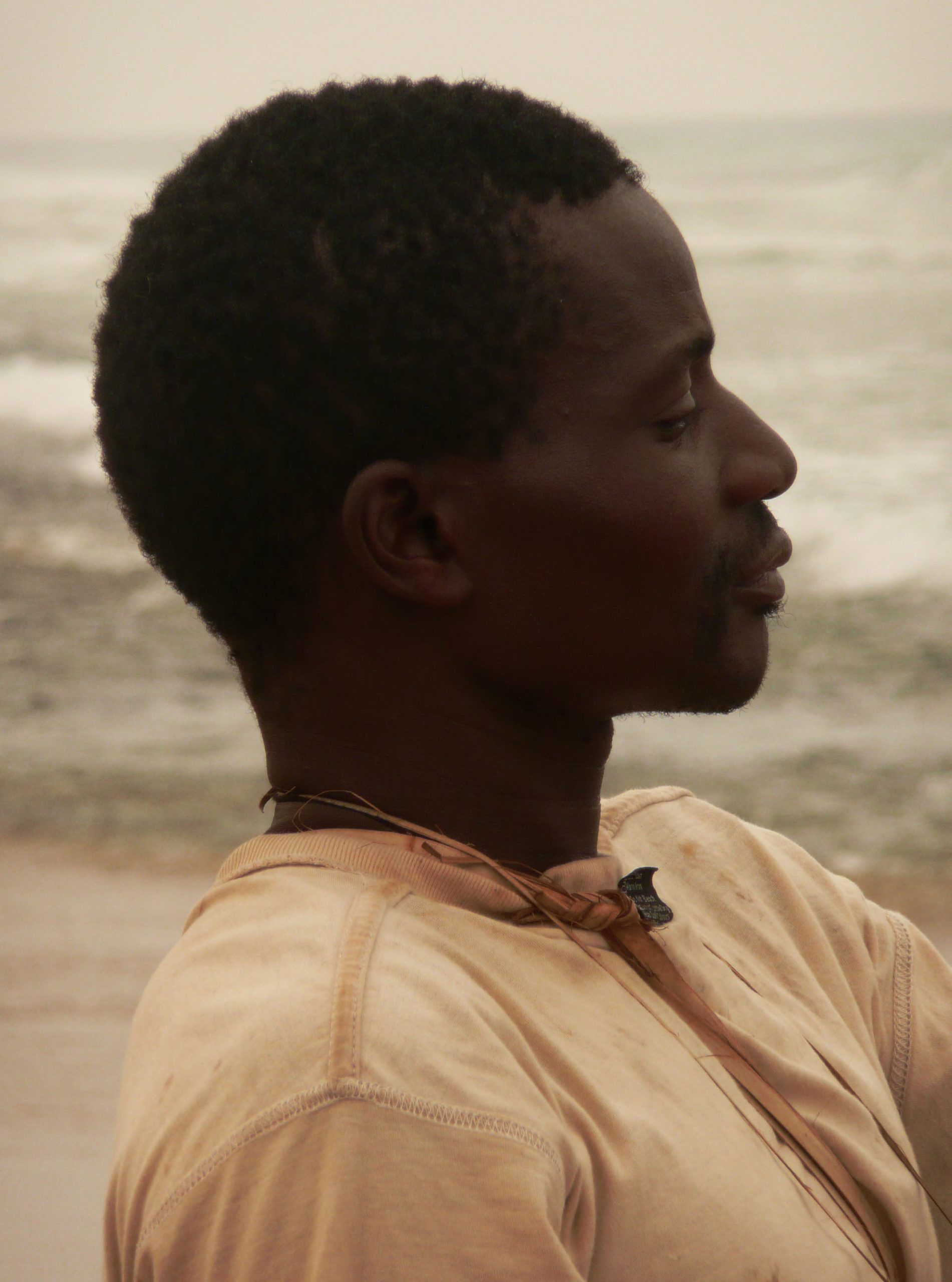 Portrait of man fishing on Tofo Beach Mozambique