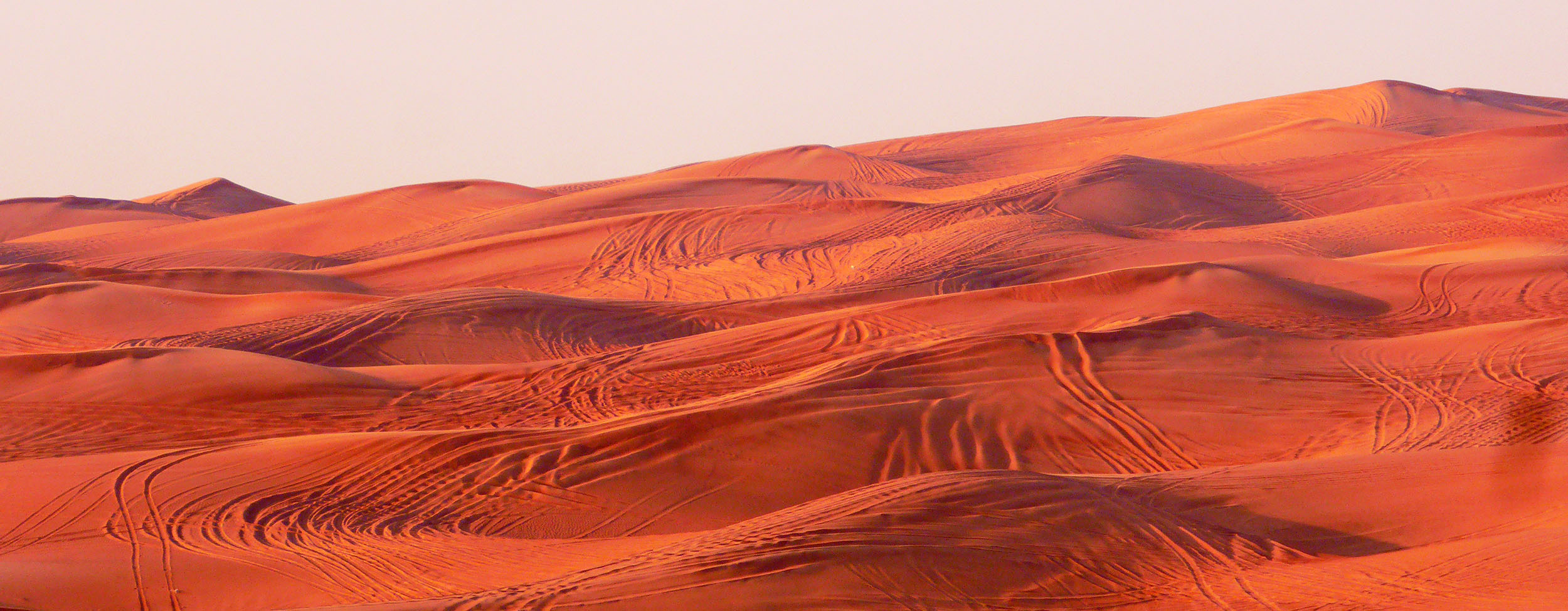 Red sand dunes at dusk near Dubai United Arab Emirates