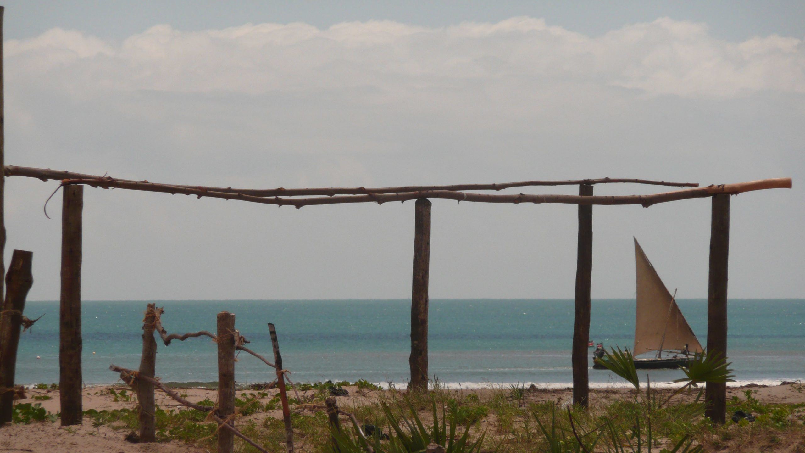 Sailboat on the water near a beach in Mombasa Kenya