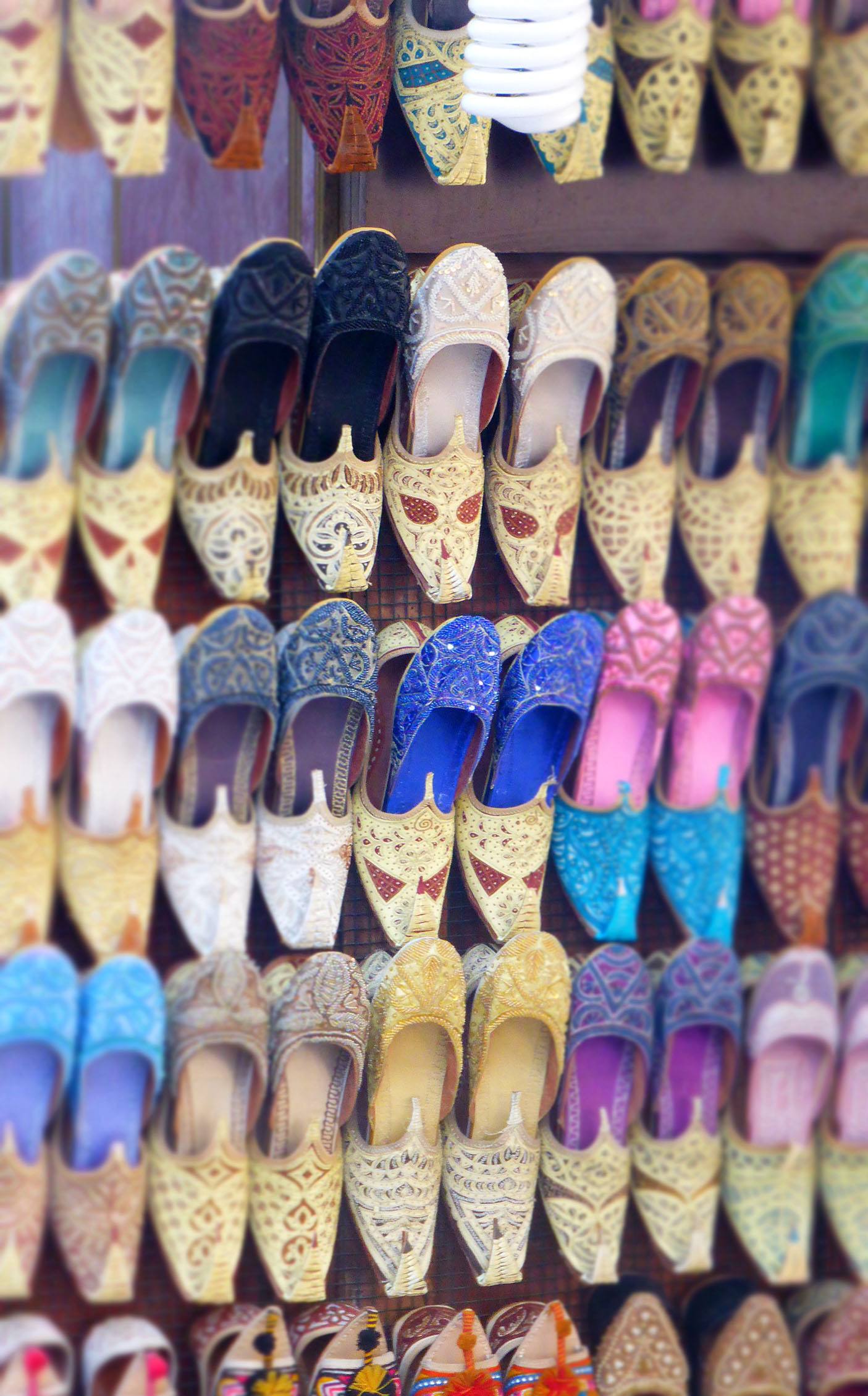 Shoes hanging on shop door in Old Souk Dubai United Arab Emirates