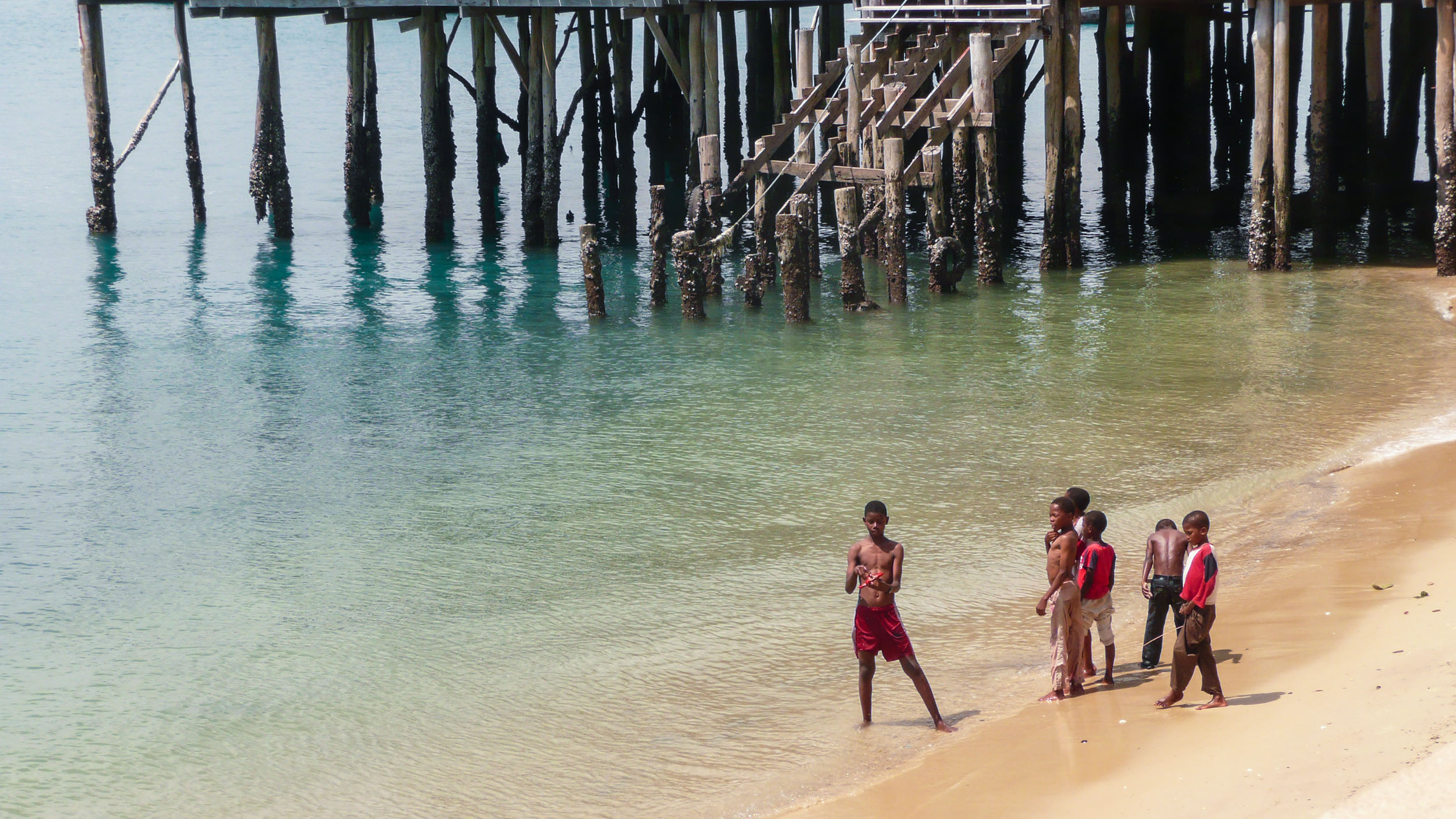 Tanzanian children playing on Nungwi Beach Zanzibar Tanzania