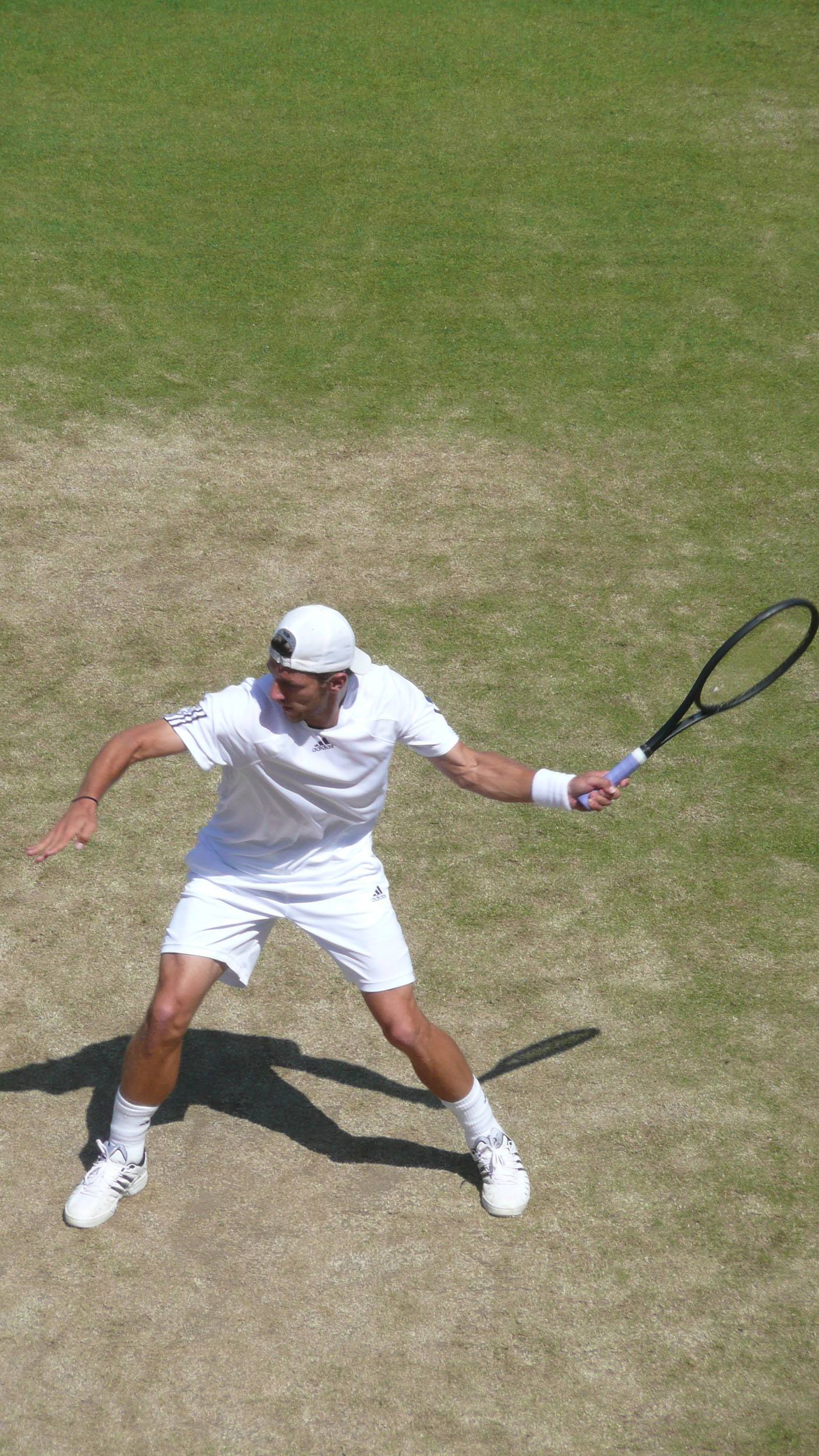 Tennis player on a court at Wimbledon London England United Kingdom