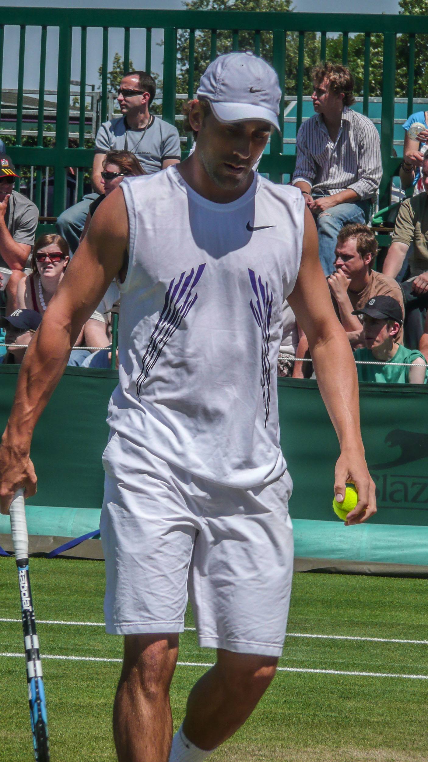 Tennis player with ball and racket in hand at Wimbledon London England United Kingdom