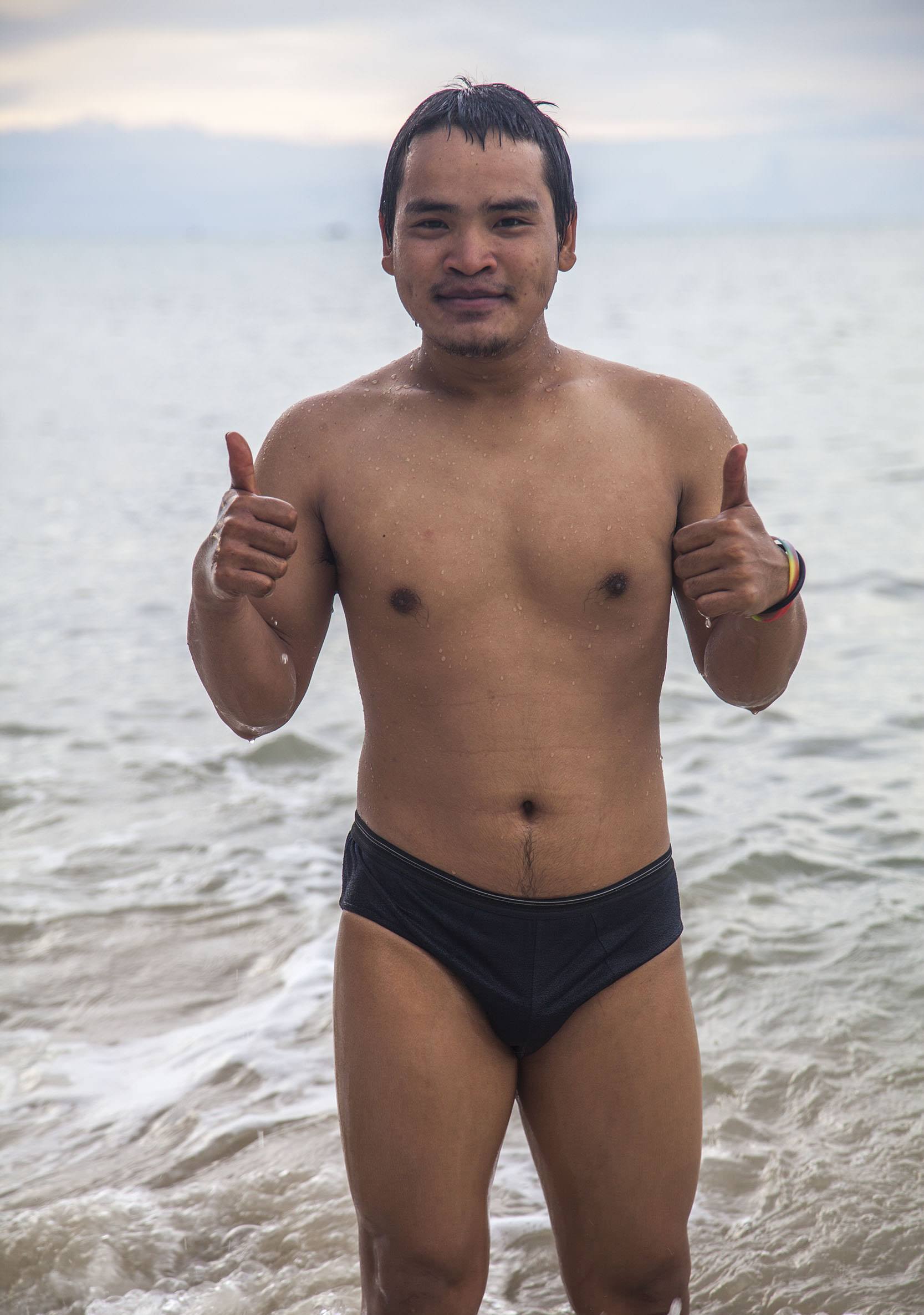 Thai man in underwear on Bang Po beach Koh Samui Thailand