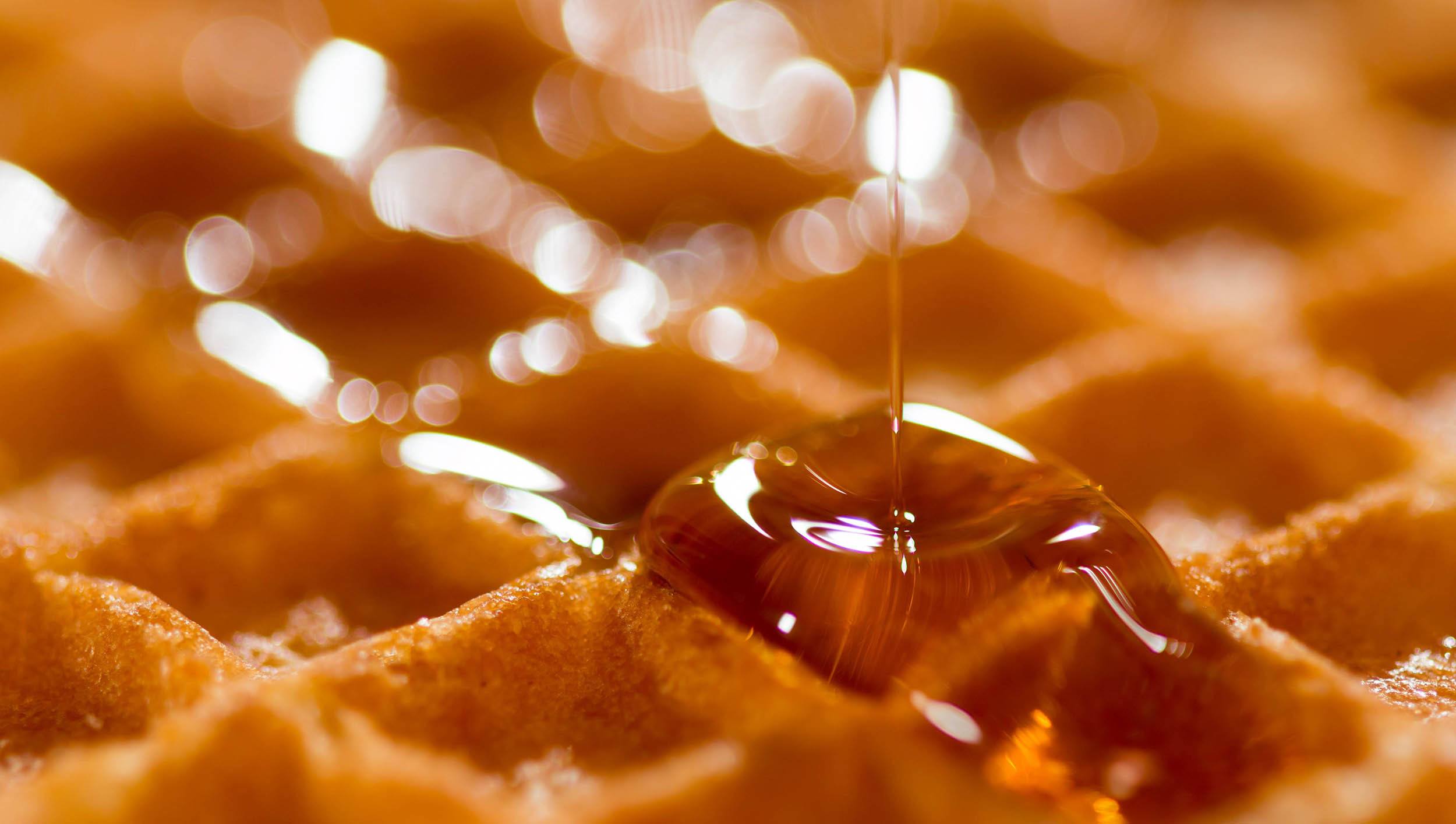 Waffle covered in honey