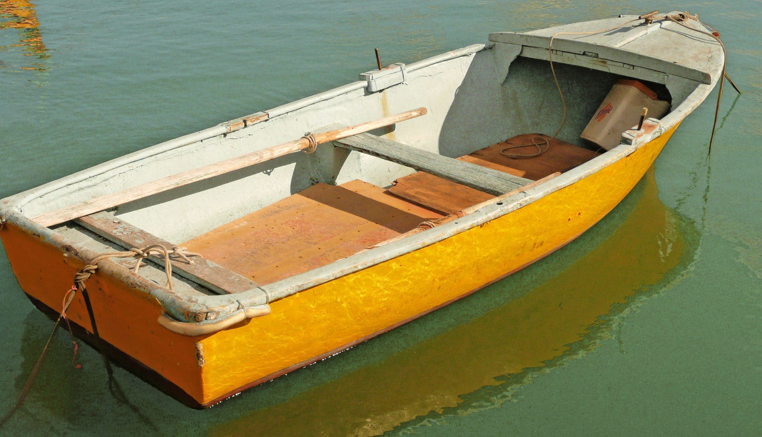 Yellow rowboat in Marsaxlokk Malta