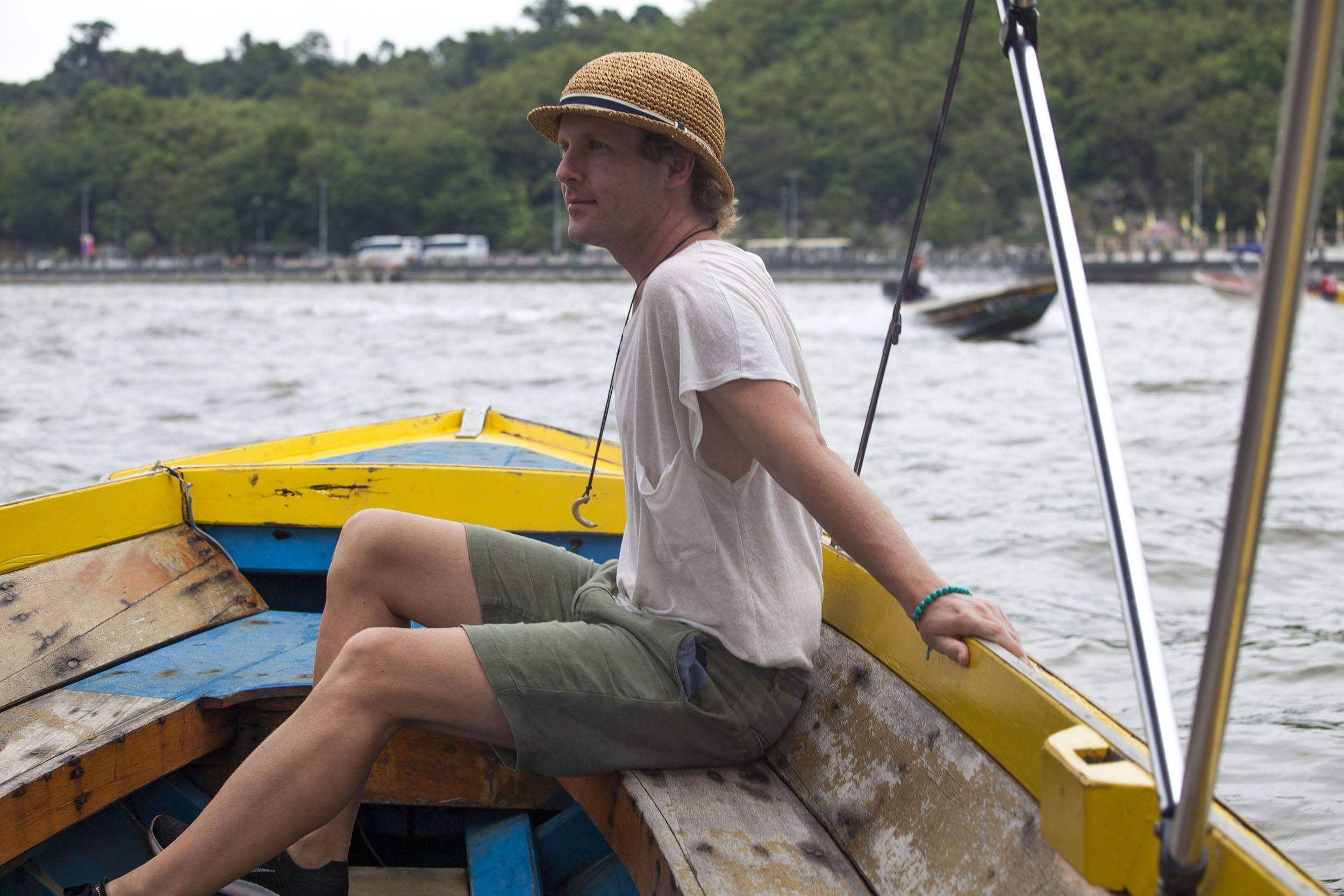 Ben travelling on a boat in and out of inlets in Bandar Seri Begawan Brunei