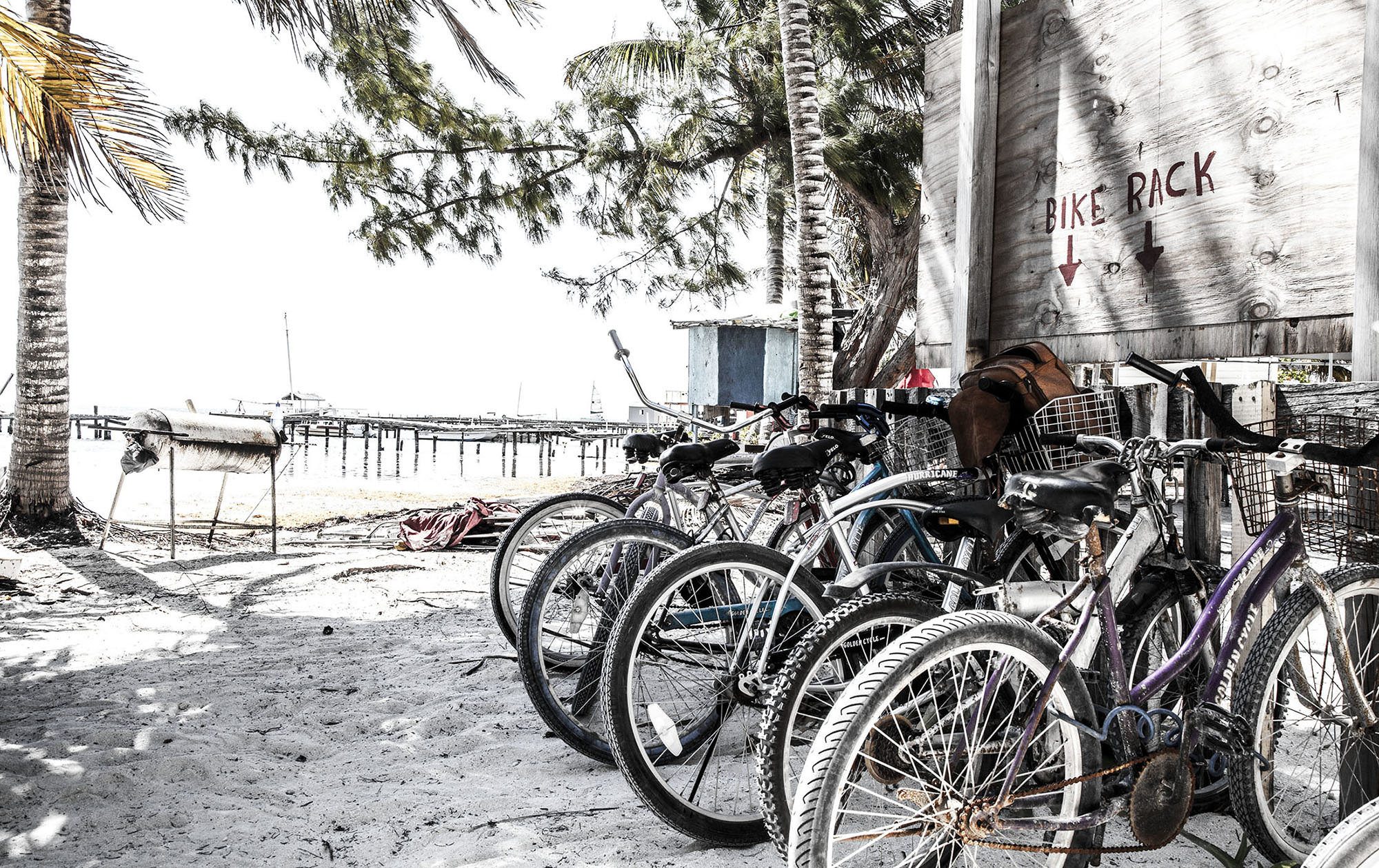 Bicycles parked at a bike rack on Caye Caulker Belize