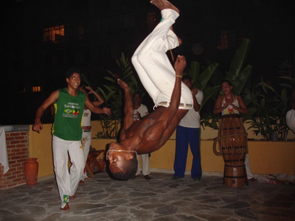 Capoeira guys on the roof terrace of Stone of a Beach Hostel in Rio de Janeiro Brazil