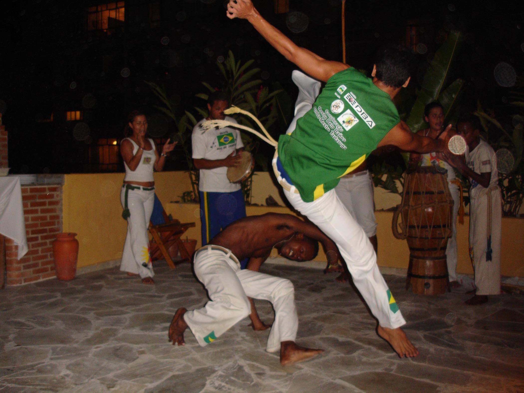 Capoeira men on the roof terrace of Stone of a Beach Hostel in Rio de Janeiro Brazil