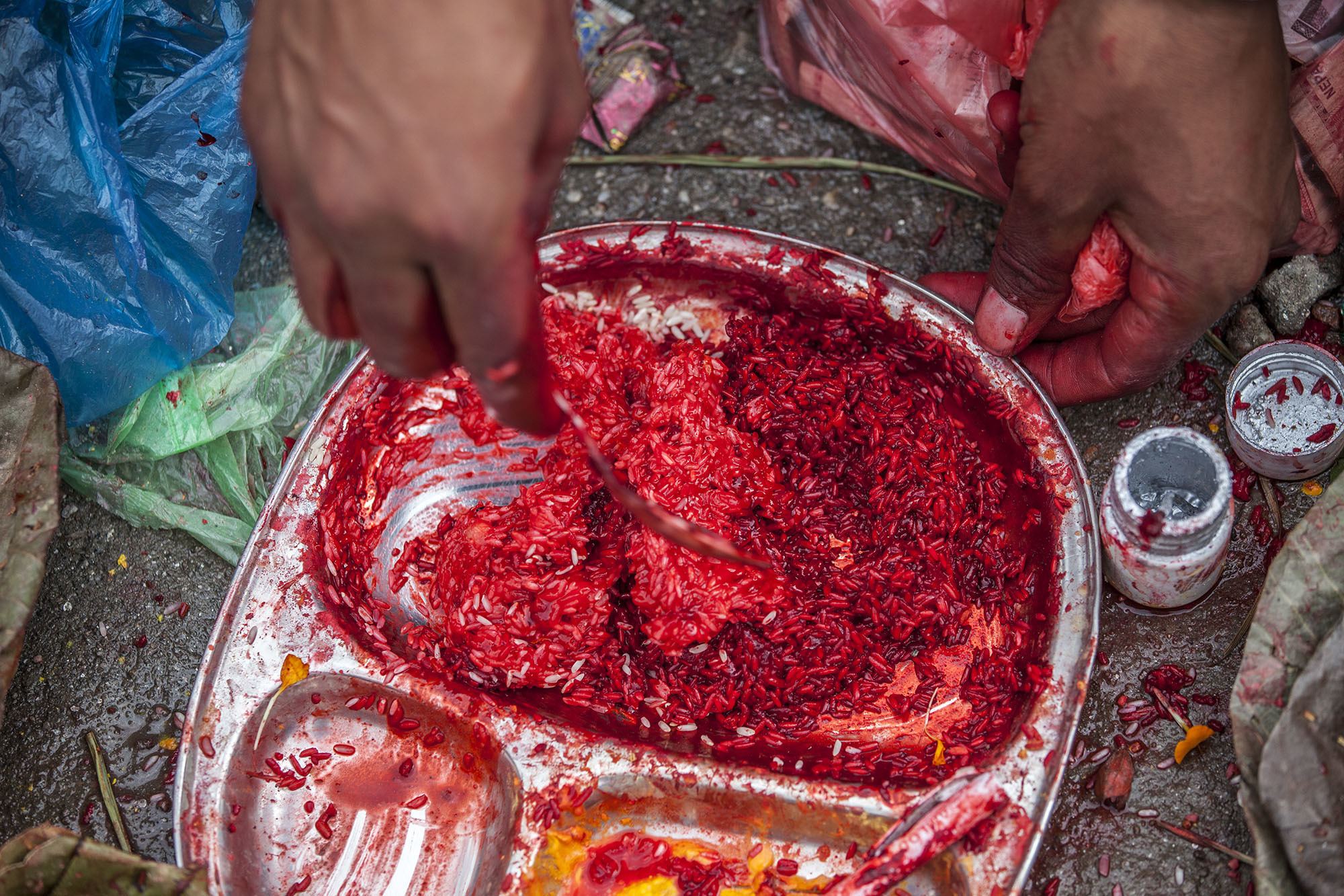 Gulal and rice for creating bindi at temple in Kathmandu Nepal