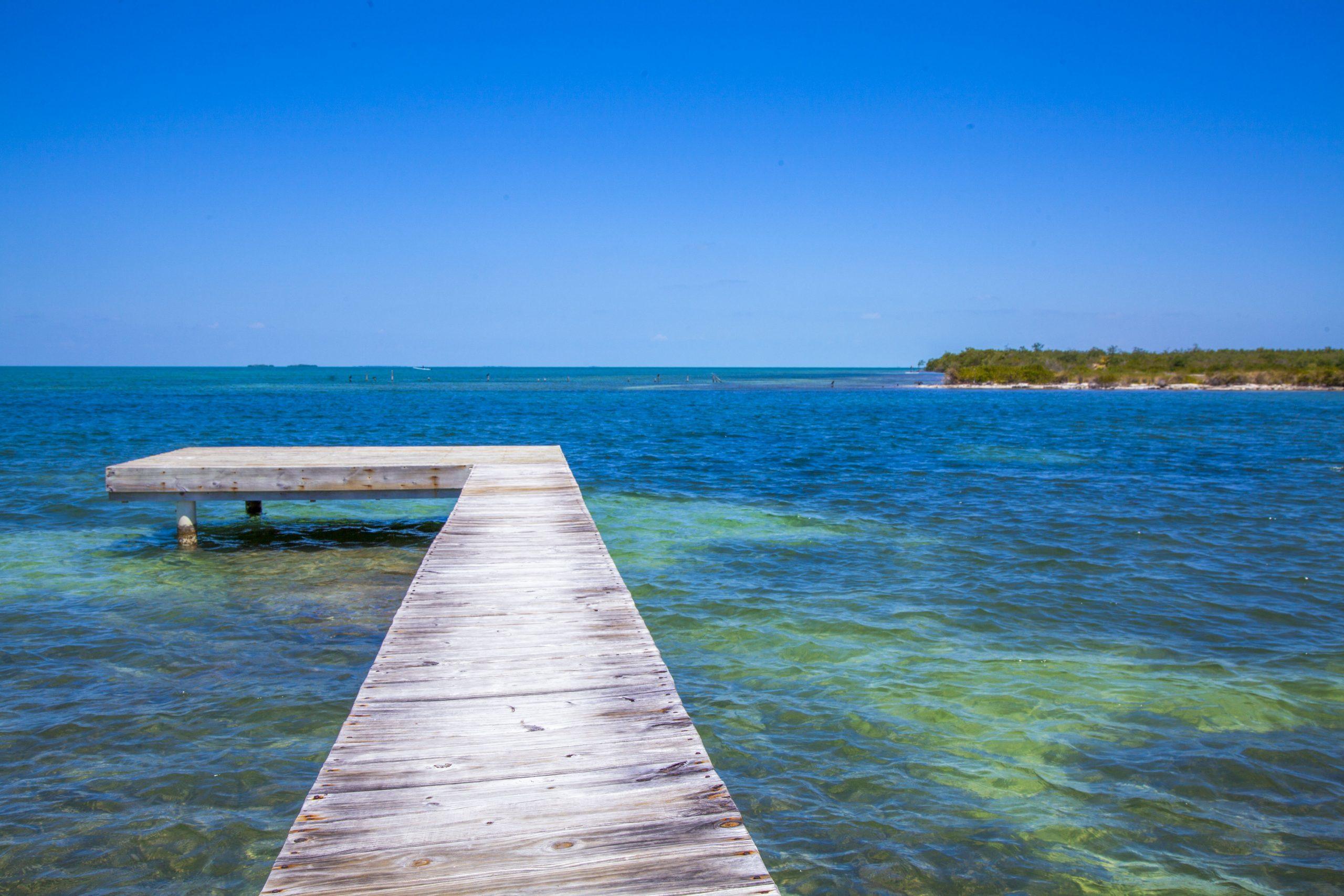 Jetty over turquoise water on Caye Caulker Belize