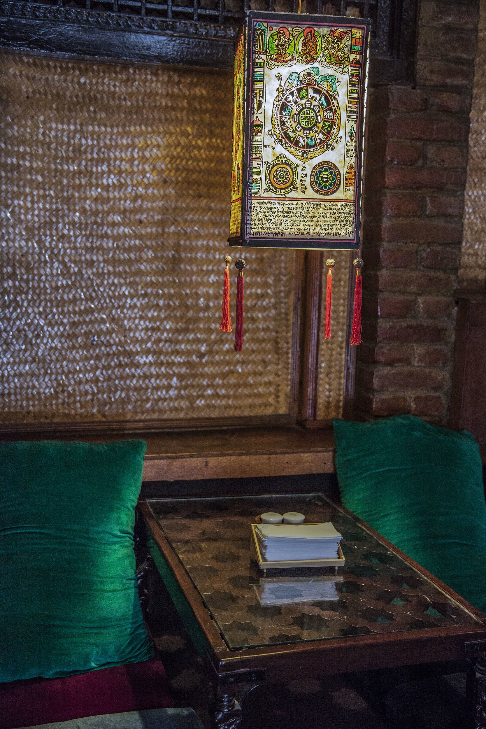 Lanterns and green cushion in Third Eye restaurant Kathmandu Nepal