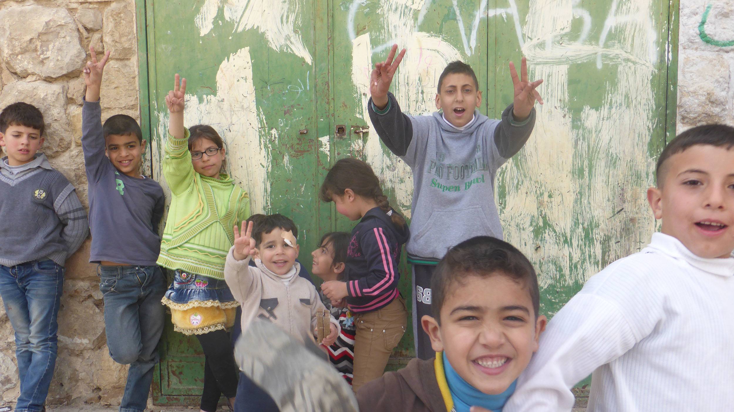 Children on a street in Hebron, Palestine