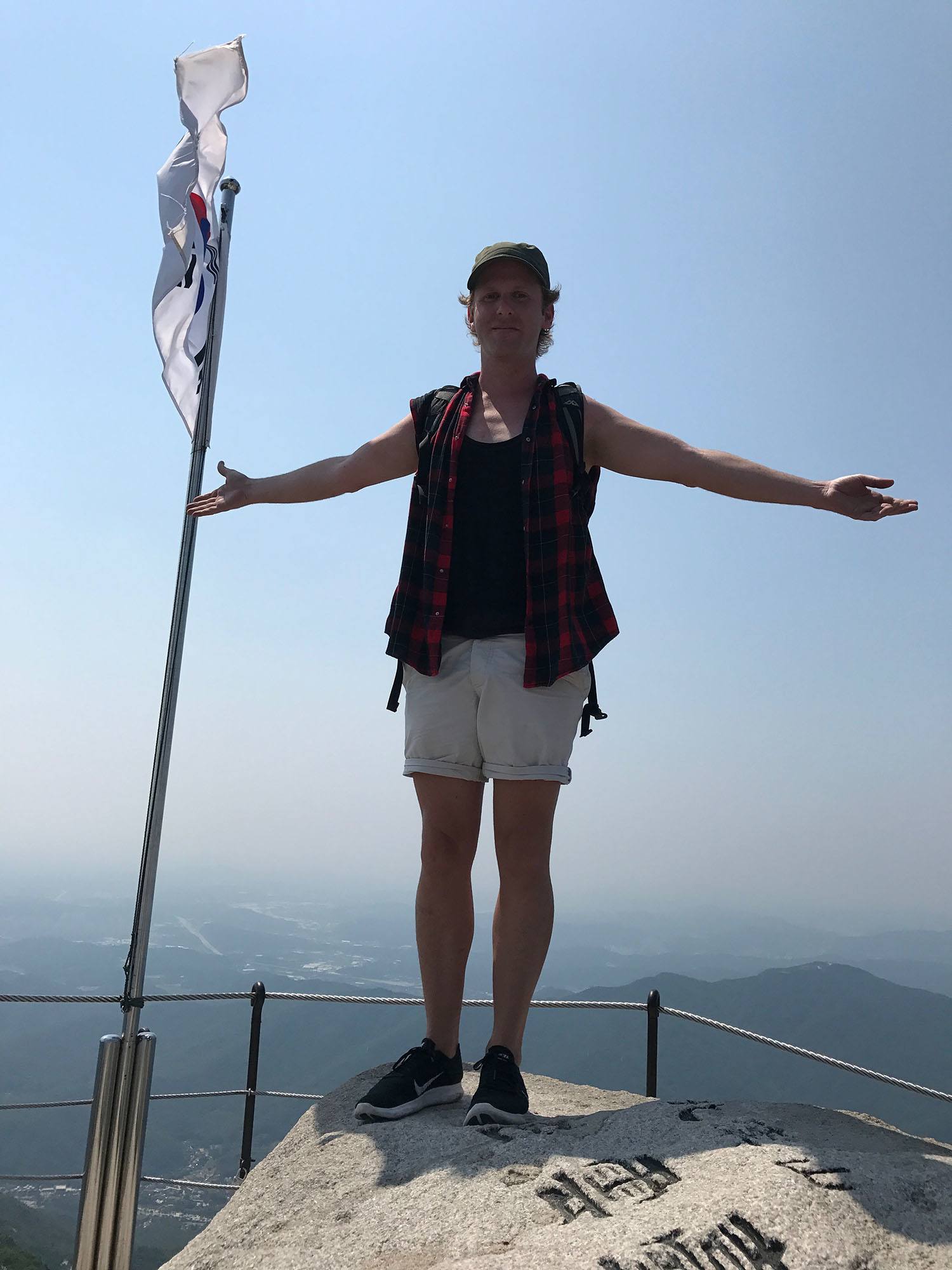Ben at the summit of Bukhansan Mountain Seoul Republic of Korea