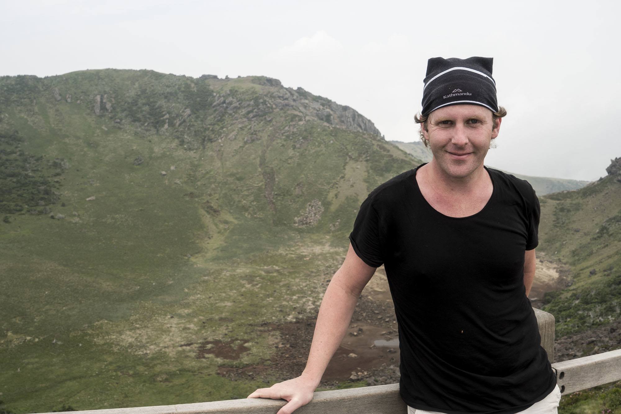 Ben at the summit of Hallasan mountain Jeju Island Republic of Korea