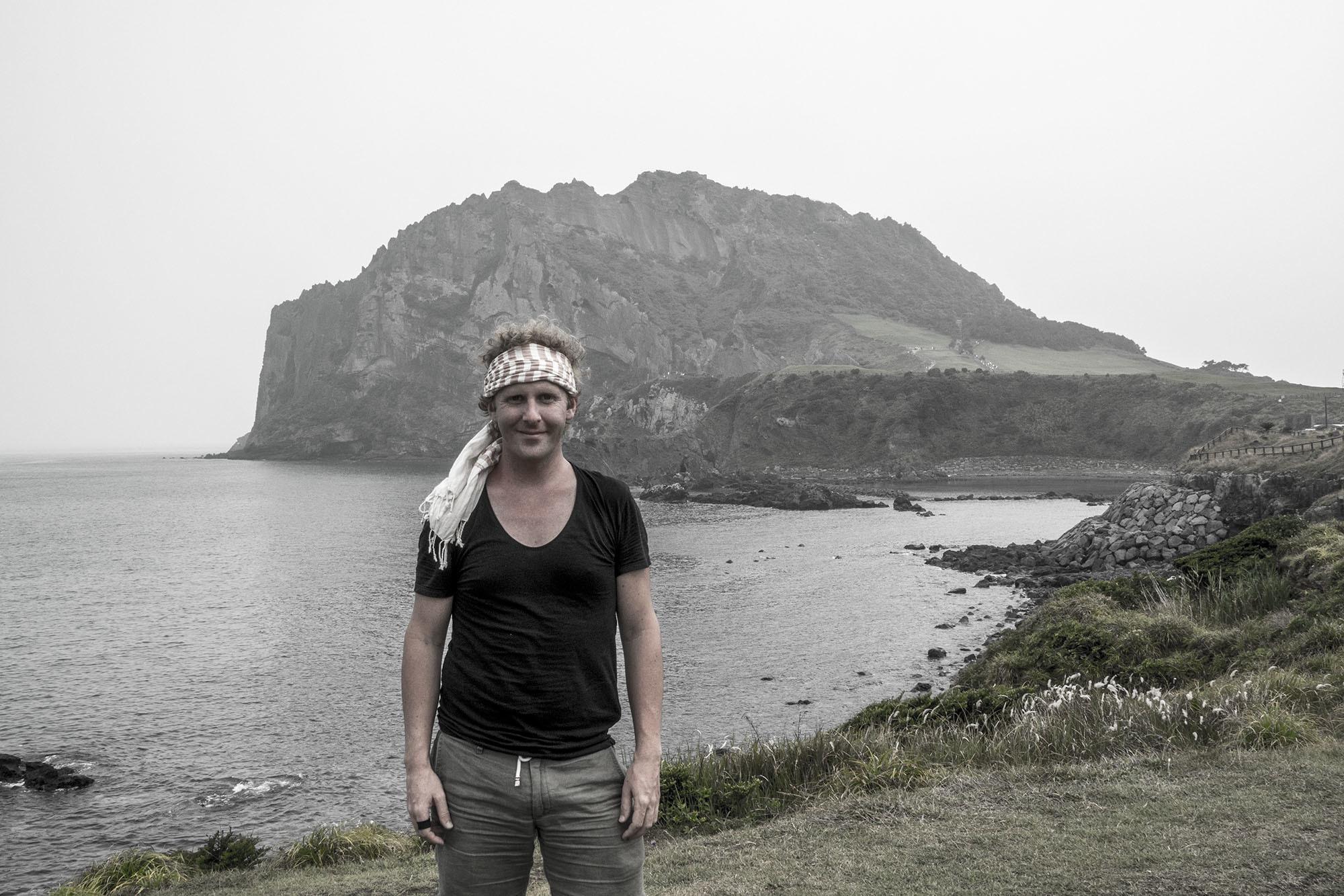 Ben in front of Ilchulbong Jeju Island Republic of Korea