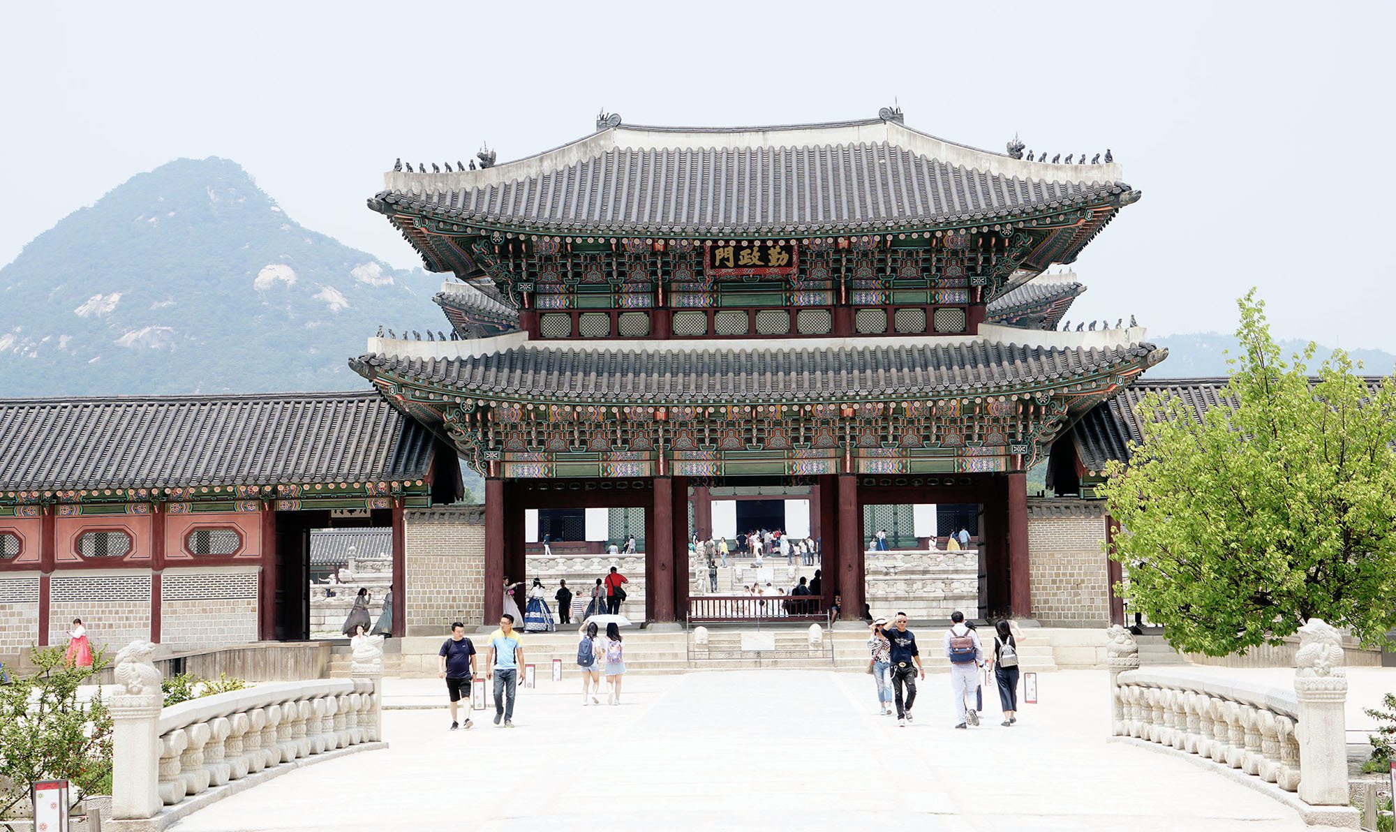 Buildings of Gyeongbokgung Palace with a backdrop of mountains Seoul Republic of Korea