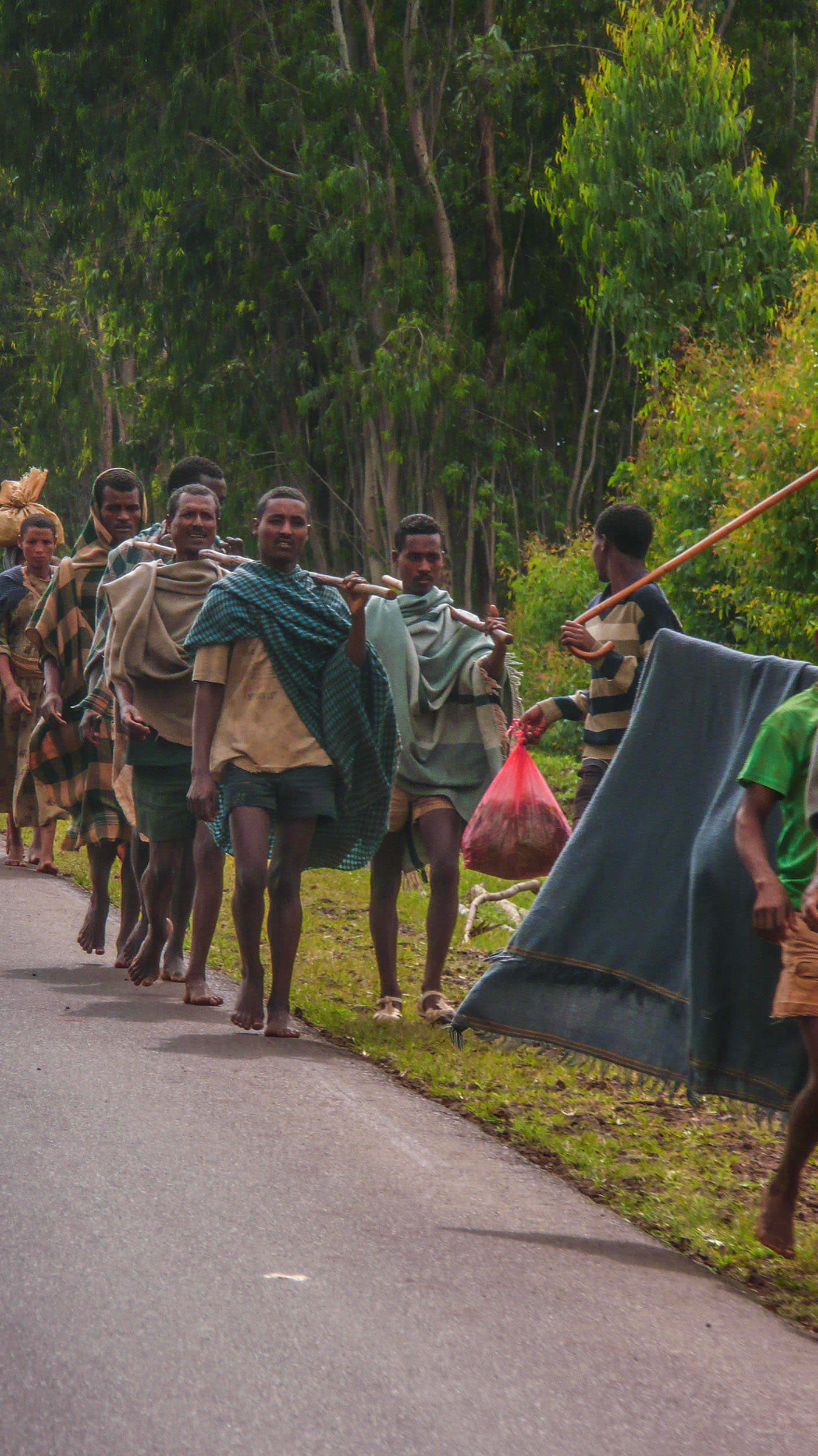 Ethiopian men walking along road Ethiopia